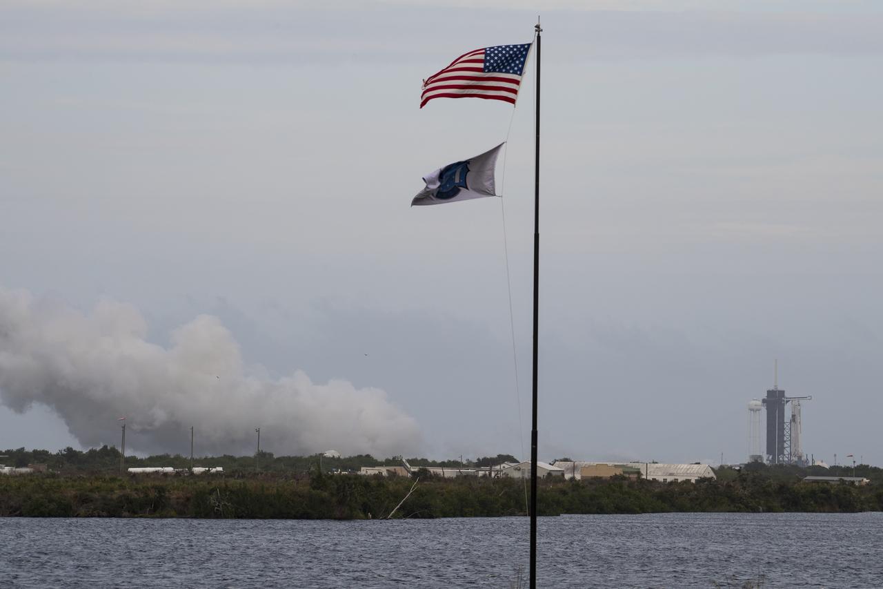 A SpaceX Falcon 9 rocket with the company's Crew Dragon spacecraft onboard is seen on the launch pad at Launch Complex 39A during a brief static fire test ahead of NASA’s SpaceX Crew-1 mission, Wednesday, Nov. 11, 2020, at NASA’s Kennedy Space Center in Florida. NASA’s SpaceX Crew-1 mission is the first operational mission of the SpaceX Crew Dragon spacecraft and Falcon 9 rocket to the International Space Station as part of the agency’s Commercial Crew Program. NASA astronauts Mike Hopkins, Victor Glover, and Shannon Walker, and astronaut Soichi Noguchi of the Japan Aerospace Exploration Agency (JAXA) are scheduled to launch at 7:49 p.m. EST on Saturday, Nov. 14, from Launch Complex 39A at the Kennedy Space Center. Photo Credit: (NASA/Aubrey Gemignani)