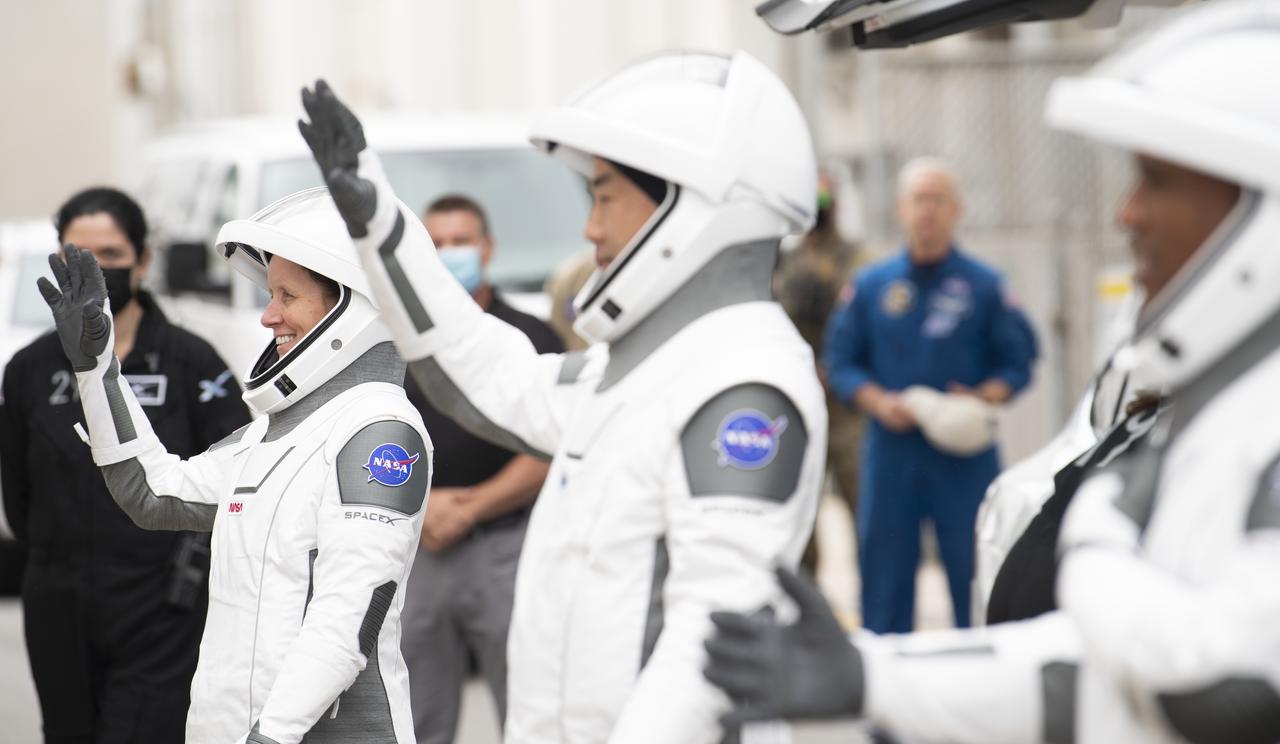 NASA astronaut Shannon Walker, left, is seen along with her fellow crewmates Japan Aerospace Exploration Agency (JAXA) astronaut Soichi Noguchi and NASA astronauts Victor Glover and Mike Hopkins, wearing SpaceX spacesuits, as they prepare to depart the Neil  A. Armstrong Operations and Checkout Building for Launch Complex 39A during a dress rehearsal prior to the Crew-1 mission launch, Thursday, Nov. 12, 2020, at NASA’s Kennedy Space Center in Florida. NASA’s SpaceX Crew-1 mission is the first operational mission of the SpaceX Crew Dragon spacecraft and Falcon 9 rocket to the International Space Station as part of the agency’s Commercial Crew Program. NASA astronauts Mike Hopkins, Victor Glover, and Shannon Walker, and astronaut Soichi Noguchi of the Japan Aerospace Exploration Agency (JAXA) are scheduled to launch at 7:49 p.m. EST on Saturday, Nov. 14, from Launch Complex 39A at the Kennedy Space Center. Photo Credit: (NASA/Joel Kowsky)