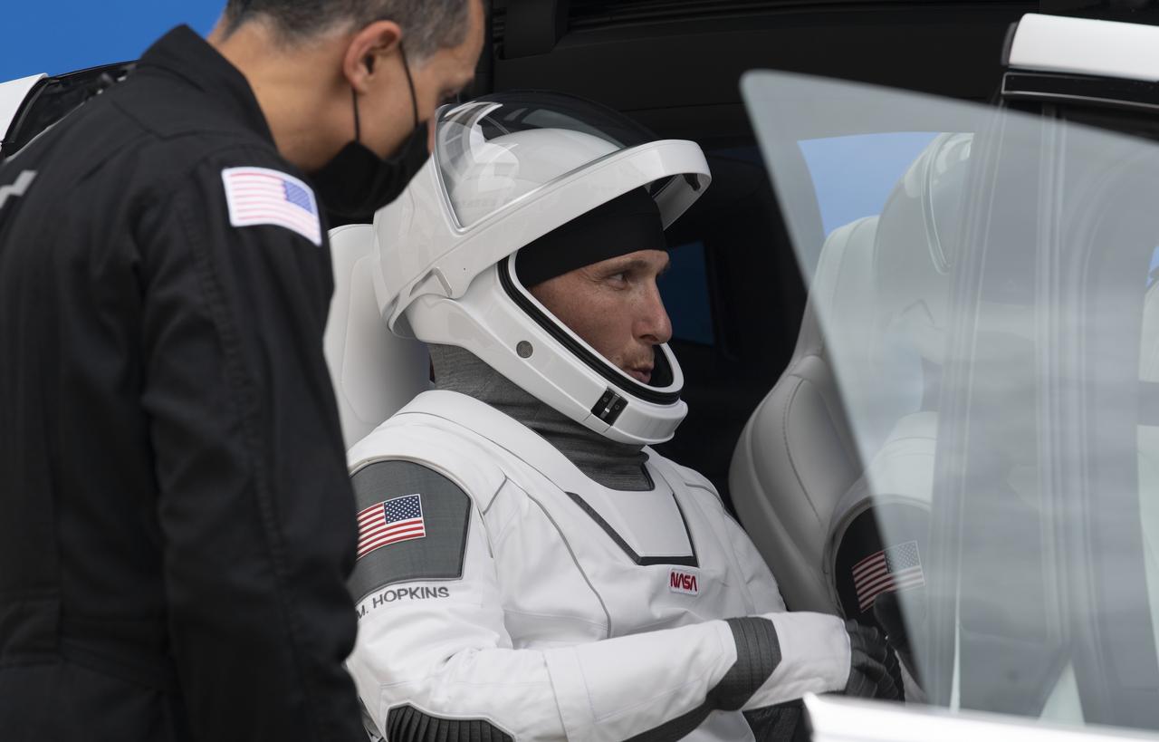 NASA astronauts Mike Hopkins, Victor Glover, Shannon Walker, and Japan Aerospace Exploration Agency (JAXA) astronaut Soichi Noguchi, wearing SpaceX spacesuits, are seen as they prepare to depart the Neil  A. Armstrong Operations and Checkout Building for Launch Complex 39A during a dress rehearsal prior to the Crew-1 mission launch, Thursday, Nov. 12, 2020, at NASA’s Kennedy Space Center in Florida. NASA’s SpaceX Crew-1 mission is the first operational mission of the SpaceX Crew Dragon spacecraft and Falcon 9 rocket to the International Space Station as part of the agency’s Commercial Crew Program. NASA astronauts Mike Hopkins, Victor Glover, and Shannon Walker, and astronaut Soichi Noguchi of the Japan Aerospace Exploration Agency (JAXA) are scheduled to launch at 7:49 p.m. EST on Saturday, Nov. 14, from Launch Complex 39A at the Kennedy Space Center. Photo Credit: (NASA/Joel Kowsky)