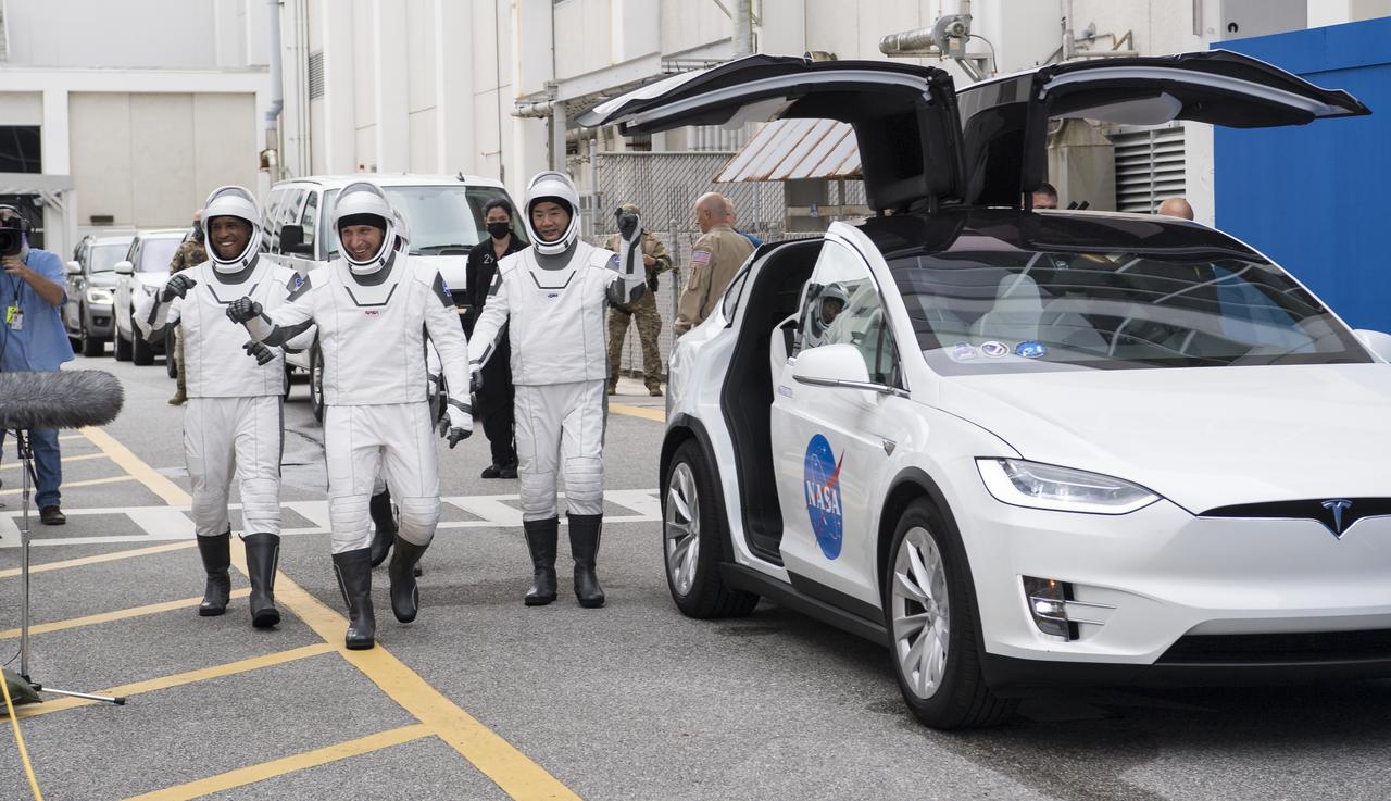NASA astronauts Mike Hopkins, Victor Glover, Shannon Walker, and Japan Aerospace Exploration Agency (JAXA) astronaut Soichi Noguchi, wearing SpaceX spacesuits, are seen as they prepare to depart the Neil  A. Armstrong Operations and Checkout Building for Launch Complex 39A during a dress rehearsal prior to the Crew-1 mission launch, Thursday, Nov. 12, 2020, at NASA’s Kennedy Space Center in Florida. NASA’s SpaceX Crew-1 mission is the first operational mission of the SpaceX Crew Dragon spacecraft and Falcon 9 rocket to the International Space Station as part of the agency’s Commercial Crew Program. NASA astronauts Mike Hopkins, Victor Glover, and Shannon Walker, and astronaut Soichi Noguchi of the Japan Aerospace Exploration Agency (JAXA) are scheduled to launch at 7:49 p.m. EST on Saturday, Nov. 14, from Launch Complex 39A at the Kennedy Space Center. Photo Credit: (NASA/Joel Kowsky)