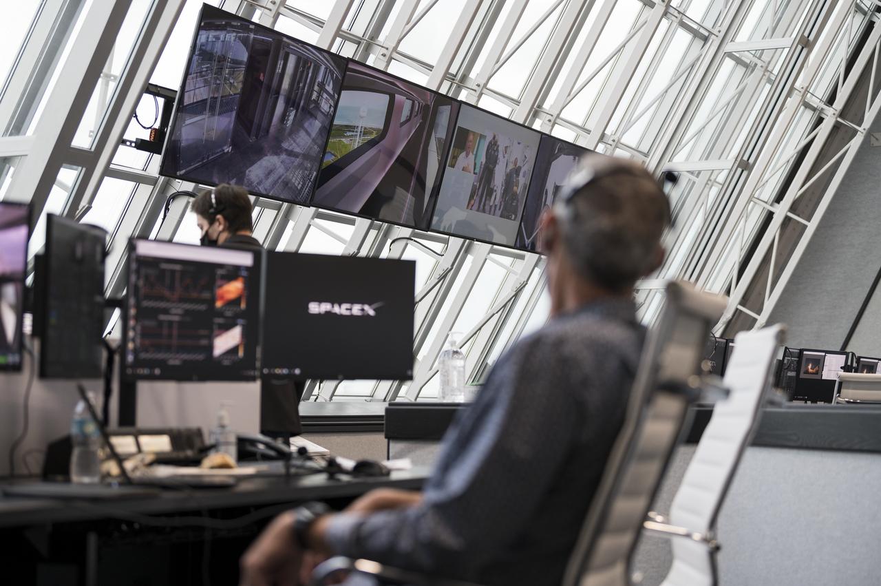 Lee Rosen, vice president, Mission and Launch Operations at SpaceX, watches the monitors during a dress rehearsal in preparation for the launch of a SpaceX Falcon 9 rocket carrying the company's Crew Dragon spacecraft on NASA’s SpaceX Crew-1 mission with NASA astronauts Mike Hopkins, Victor Glover, Shannon Walker, and Japan Aerospace Exploration Agency (JAXA) astronaut Soichi Noguchi onboard, Thursday, Nov. 12, 2020, in firing room four of the Launch Control Center at NASA’s Kennedy Space Center in Florida. NASA’s SpaceX Crew-1 mission is the first crew rotation mission of the SpaceX Crew Dragon spacecraft and Falcon 9 rocket to the International Space Station as part of the agency’s Commercial Crew Program. Hopkins, Glover, Walker, and Noguchi are scheduled to launch at 7:49 p.m. EST on Saturday, Nov. 14, from Launch Complex 39A at the Kennedy Space Center. Photo Credit: (NASA/Aubrey Gemignani)
