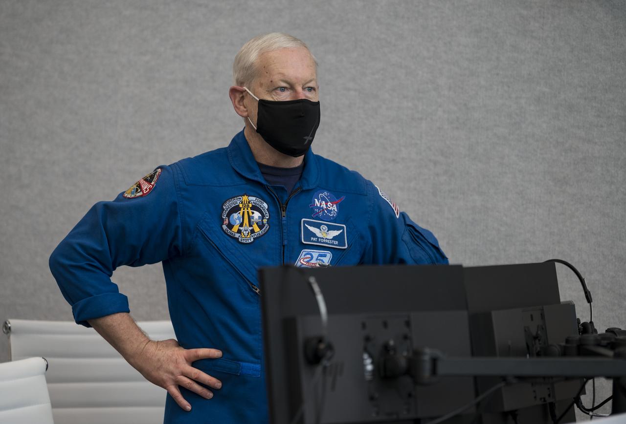 Pat Forrester, Chief of the Astronaut Office, watches the monitors during a dress rehearsal in preparation for the launch of a SpaceX Falcon 9 rocket carrying the company's Crew Dragon spacecraft on NASA’s SpaceX Crew-1 mission with NASA astronauts Mike Hopkins, Victor Glover, Shannon Walker, and Japan Aerospace Exploration Agency (JAXA) astronaut Soichi Noguchi onboard, Thursday, Nov. 12, 2020, in firing room four of the Launch Control Center at NASA’s Kennedy Space Center in Florida. NASA’s SpaceX Crew-1 mission is the first crew rotation mission of the SpaceX Crew Dragon spacecraft and Falcon 9 rocket to the International Space Station as part of the agency’s Commercial Crew Program. Hopkins, Glover, Walker, and Noguchi are scheduled to launch at 7:49 p.m. EST on Saturday, Nov. 14, from Launch Complex 39A at the Kennedy Space Center. Photo Credit: (NASA/Aubrey Gemignani)