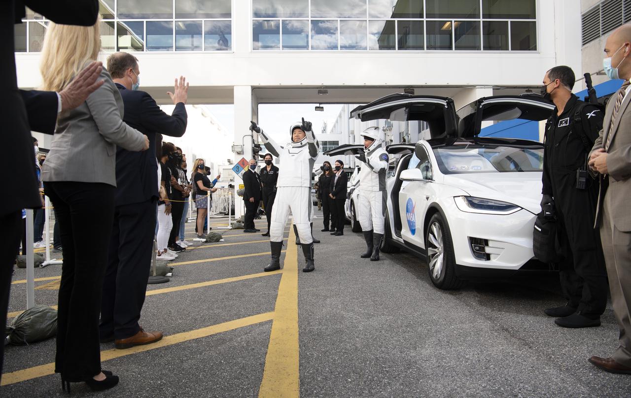 Japan Aerospace Exploration Agency (JAXA) astronaut Soichi Noguchi, wearing a SpaceX spacesuit, is seen as he prepare to depart the Neil  A. Armstrong Operations and Checkout Building with his fellow crewmates NASA astronauts Victor Glover, Mike Hopkins, and Shannon Walker for Launch Complex 39A to board the SpaceX Crew Dragon spacecraft for the Crew-1 mission launch, Sunday, Nov. 15, 2020, at NASA’s Kennedy Space Center in Florida. NASA’s SpaceX Crew-1 mission is the first crew rotation mission of the SpaceX Crew Dragon spacecraft and Falcon 9 rocket to the International Space Station as part of the agency’s Commercial Crew Program. Hopkins, Glover, Walker, and Noguchi are scheduled to launch at 7:27 p.m. EST, from Launch Complex 39A at the Kennedy Space Center.  Photo Credit: (NASA/Joel Kowsky)
