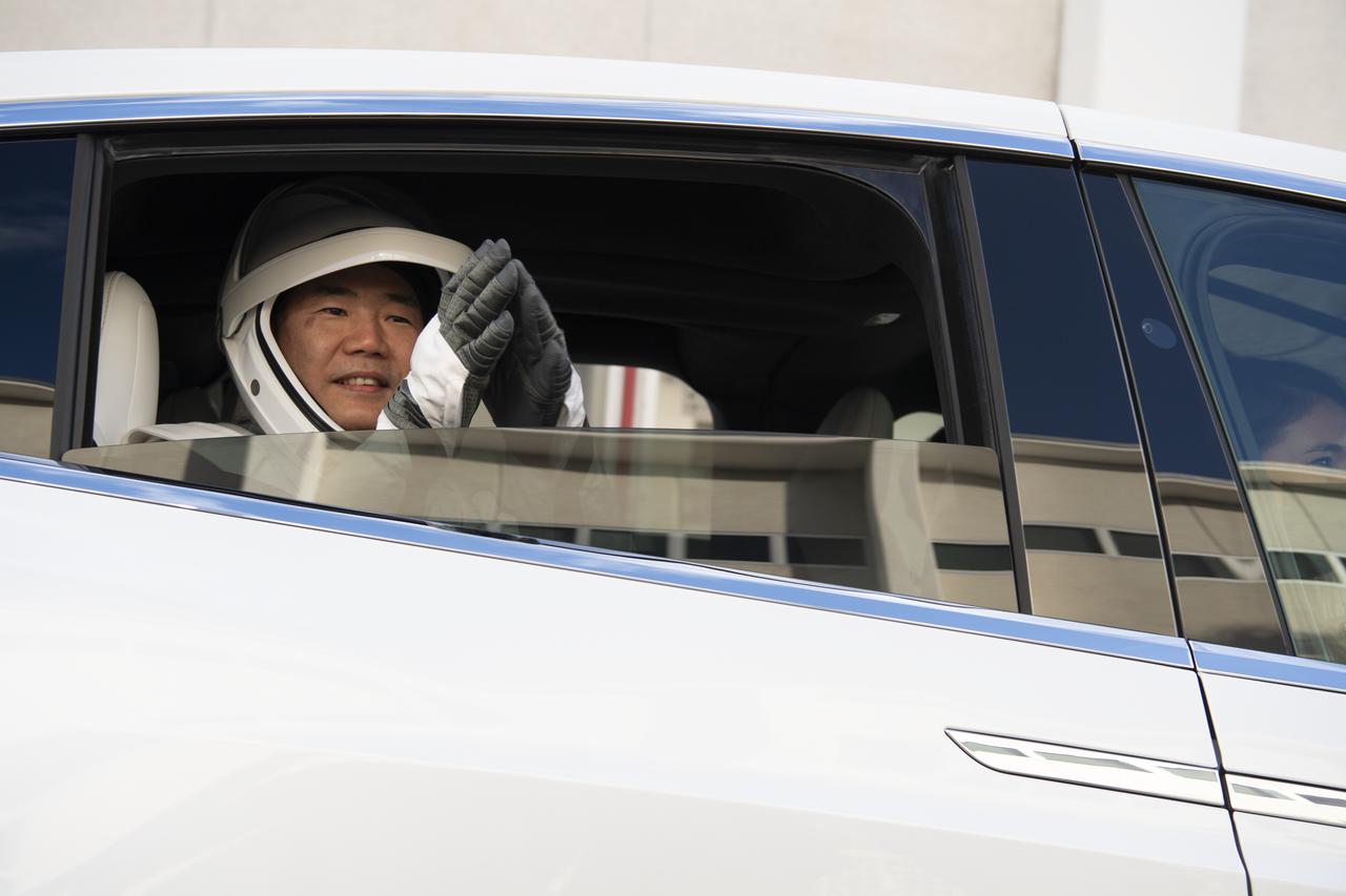 Japan Aerospace Exploration Agency (JAXA) astronaut Soichi Noguchi is seen as he departs the Neil  A. Armstrong Operations and Checkout Building for Launch Complex 39A with his fellow crewmates NASA astronauts Shannon Walker, Victor Glover, and Mike Hopkins to board the SpaceX Crew Dragon spacecraft for the Crew-1 mission launch, Sunday, Nov. 15, 2020, at NASA’s Kennedy Space Center in Florida. NASA’s SpaceX Crew-1 mission is the first crew rotation mission of the SpaceX Crew Dragon spacecraft and Falcon 9 rocket to the International Space Station as part of the agency’s Commercial Crew Program. Hopkins, Glover, Walker, and Noguchi are scheduled to launch at 7:27 p.m. EST, from Launch Complex 39A at the Kennedy Space Center.  Photo Credit: (NASA/Joel Kowsky)