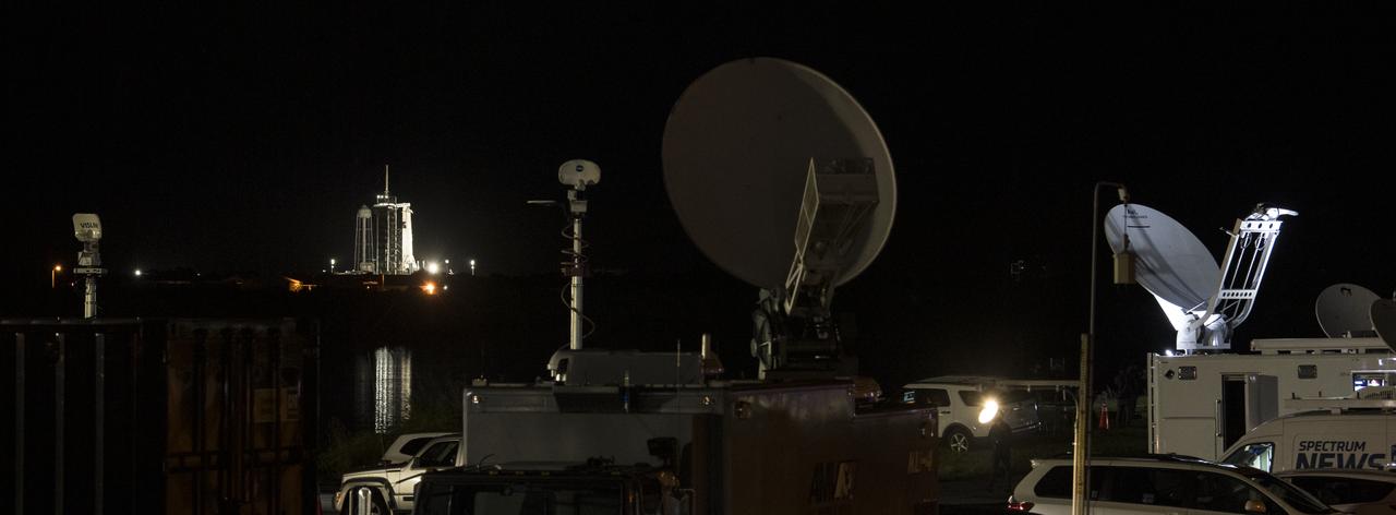 A SpaceX Falcon 9 rocket with the company's Crew Dragon spacecraft onboard is seen on the launch pad at Launch Complex 39A as the countdown continues for the launch of the Crew-1 mission, Sunday, Nov. 15, 2020, at NASA’s Kennedy Space Center in Florida. NASA’s SpaceX Crew-1 mission is the first crew rotation mission of the SpaceX Crew Dragon spacecraft and Falcon 9 rocket to the International Space Station as part of the agency’s Commercial Crew Program. NASA astronauts Mike Hopkins, Victor Glover, and Shannon Walker, and astronaut Soichi Noguchi of the Japan Aerospace Exploration Agency (JAXA) are scheduled to launch at 7:27 p.m. EST, from Launch Complex 39A at the Kennedy Space Center. Photo Credit: (NASA/Joel Kowsky)