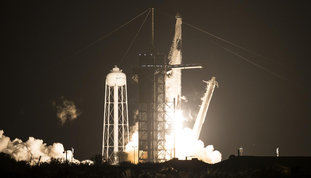 A SpaceX Falcon 9 rocket carrying the company's Crew Dragon spacecraft is launched on NASA’s SpaceX Crew-1 mission to the International Space Station with NASA astronauts Mike Hopkins, Victor Glover, Shannon Walker, and Japan Aerospace Exploration Agency astronaut Soichi Noguchi onboard, Sunday, Nov. 15, 2020, at NASA’s Kennedy Space Center in Florida. NASA’s SpaceX Crew-1 mission is the first crew rotation mission of the SpaceX Crew Dragon spacecraft and Falcon 9 rocket to the International Space Station as part of the agency’s Commercial Crew Program. Hopkins, Glover, Walker, and Noguchi launched at 7:27 p.m. EST from Launch Complex 39A at the Kennedy Space Center to begin a six month mission onboard the orbital outpost. Photo Credit: (NASA/Joel Kowsky)