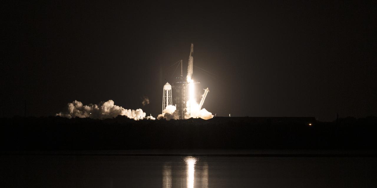 A SpaceX Falcon 9 rocket carrying the company's Crew Dragon spacecraft is launched on NASA’s SpaceX Crew-1 mission to the International Space Station with NASA astronauts Mike Hopkins, Victor Glover, Shannon Walker, and Japan Aerospace Exploration Agency astronaut Soichi Noguchi onboard, Sunday, Nov. 15, 2020, at NASA’s Kennedy Space Center in Florida. NASA’s SpaceX Crew-1 mission is the first crew rotation mission of the SpaceX Crew Dragon spacecraft and Falcon 9 rocket to the International Space Station as part of the agency’s Commercial Crew Program. Hopkins, Glover, Walker, and Noguchi launched at 7:27 p.m. EST from Launch Complex 39A at the Kennedy Space Center to begin a six month mission onboard the orbital outpost. Photo Credit: (NASA/Joel Kowsky)