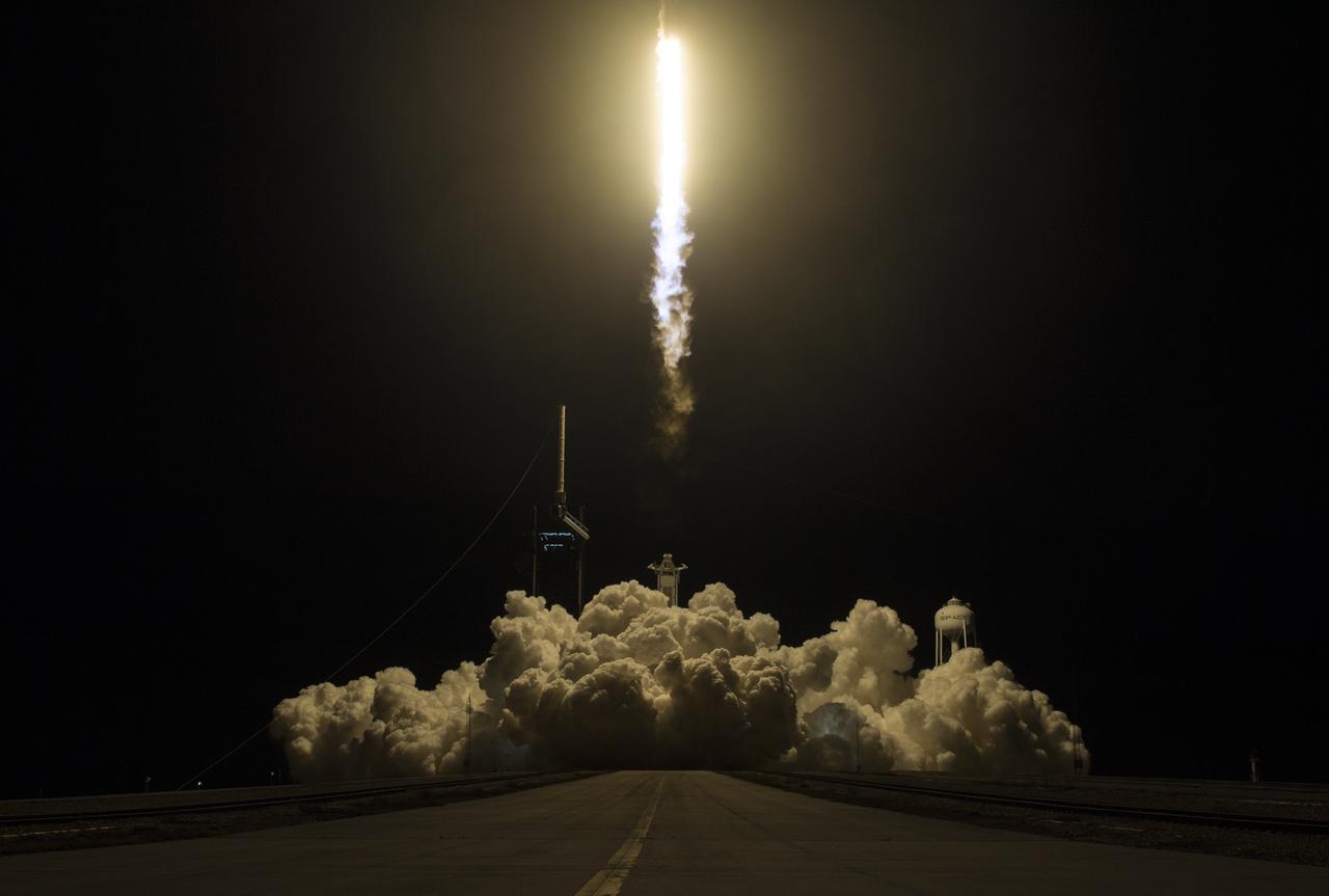 ]A SpaceX Falcon 9 rocket carrying the company's Crew Dragon spacecraft is launched on NASA’s SpaceX Crew-1 mission to the International Space Station with NASA astronauts Mike Hopkins, Victor Glover, Shannon Walker, and Japan Aerospace Exploration Agency astronaut Soichi Noguchi onboard, Sunday, Nov. 15, 2020, at NASA’s Kennedy Space Center in Florida. NASA’s SpaceX Crew-1 mission is the first crew rotation mission of the SpaceX Crew Dragon spacecraft and Falcon 9 rocket to the International Space Station as part of the agency’s Commercial Crew Program. Hopkins, Glover, Walker, and Noguchi launched at 7:27 p.m. EST from Launch Complex 39A at the Kennedy Space Center to begin a six month mission onboard the orbital outpost. Photo Credit: (NASA/Joel Kowsky)