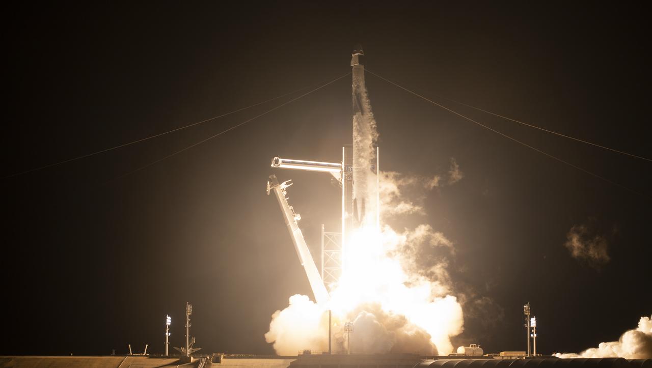 A SpaceX Falcon 9 rocket carrying the company's Crew Dragon spacecraft is launched on NASA’s SpaceX Crew-1 mission to the International Space Station with NASA astronauts Mike Hopkins, Victor Glover, Shannon Walker, and Japan Aerospace Exploration Agency astronaut Soichi Noguchi onboard, Sunday, Nov. 15, 2020, at NASA’s Kennedy Space Center in Florida. NASA’s SpaceX Crew-1 mission is the first crew rotation mission of the SpaceX Crew Dragon spacecraft and Falcon 9 rocket to the International Space Station as part of the agency’s Commercial Crew Program. Hopkins, Glover, Walker, and Noguchi launched at 7:27 p.m. EST from Launch Complex 39A at the Kennedy Space Center to begin a six month mission onboard the orbital outpost. Photo Credit: (NASA/Joel Kowsky)