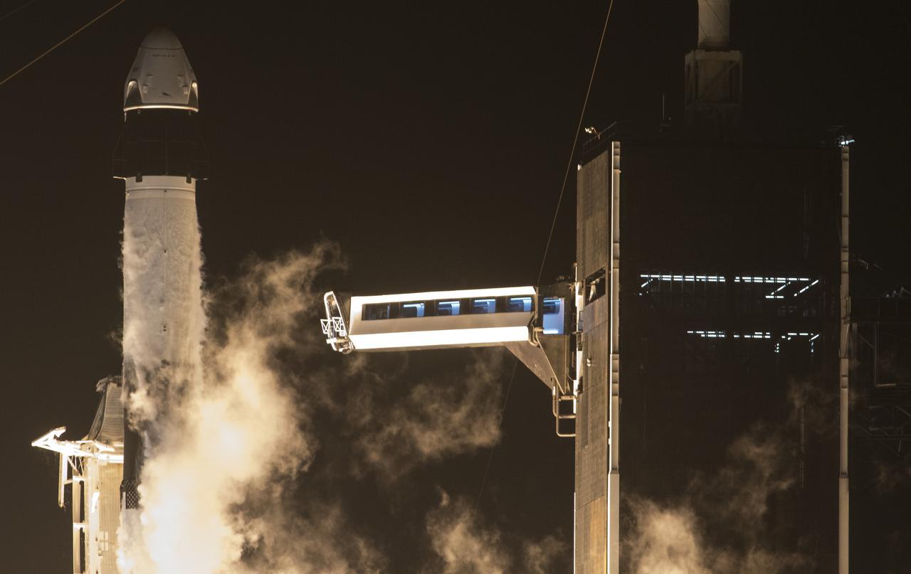 A SpaceX Falcon 9 rocket carrying the company's Crew Dragon spacecraft is launched on NASA’s SpaceX Crew-1 mission to the International Space Station with NASA astronauts Mike Hopkins, Victor Glover, Shannon Walker, and Japan Aerospace Exploration Agency astronaut Soichi Noguchi onboard, Sunday, Nov. 15, 2020, at NASA’s Kennedy Space Center in Florida. NASA’s SpaceX Crew-1 mission is the first crew rotation mission of the SpaceX Crew Dragon spacecraft and Falcon 9 rocket to the International Space Station as part of the agency’s Commercial Crew Program. Hopkins, Glover, Walker, and Noguchi launched at 7:27 p.m. EST from Launch Complex 39A at the Kennedy Space Center to begin a six month mission onboard the orbital outpost. Photo Credit: (NASA/Joel Kowsky)