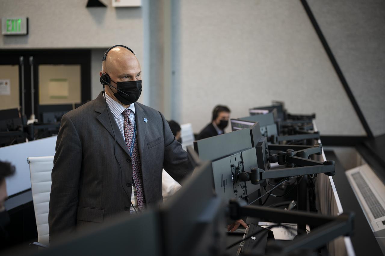 Michael Hess, acting associate director of NASA’s Johnson Space Center, monitors the countdown of the launch of a SpaceX Falcon 9 rocket carrying the company's Crew Dragon spacecraft on NASA’s SpaceX Crew-1 mission with NASA astronauts Mike Hopkins, Victor Glover, Shannon Walker, and Japan Aerospace Exploration Agency (JAXA) astronaut Soichi Noguchi onboard, Sunday, Nov. 15, 2020, in firing room four of the Launch Control Center at NASA’s Kennedy Space Center in Florida. NASA’s SpaceX Crew-1 mission is the first crew rotation mission of the SpaceX Crew Dragon spacecraft and Falcon 9 rocket to the International Space Station as part of the agency’s Commercial Crew Program. Hopkins, Glover, Walker, and Noguchi are scheduled to launch at 7:27 p.m. EST, from Launch Complex 39A at the Kennedy Space Center. Photo Credit: (NASA/Aubrey Gemignani)