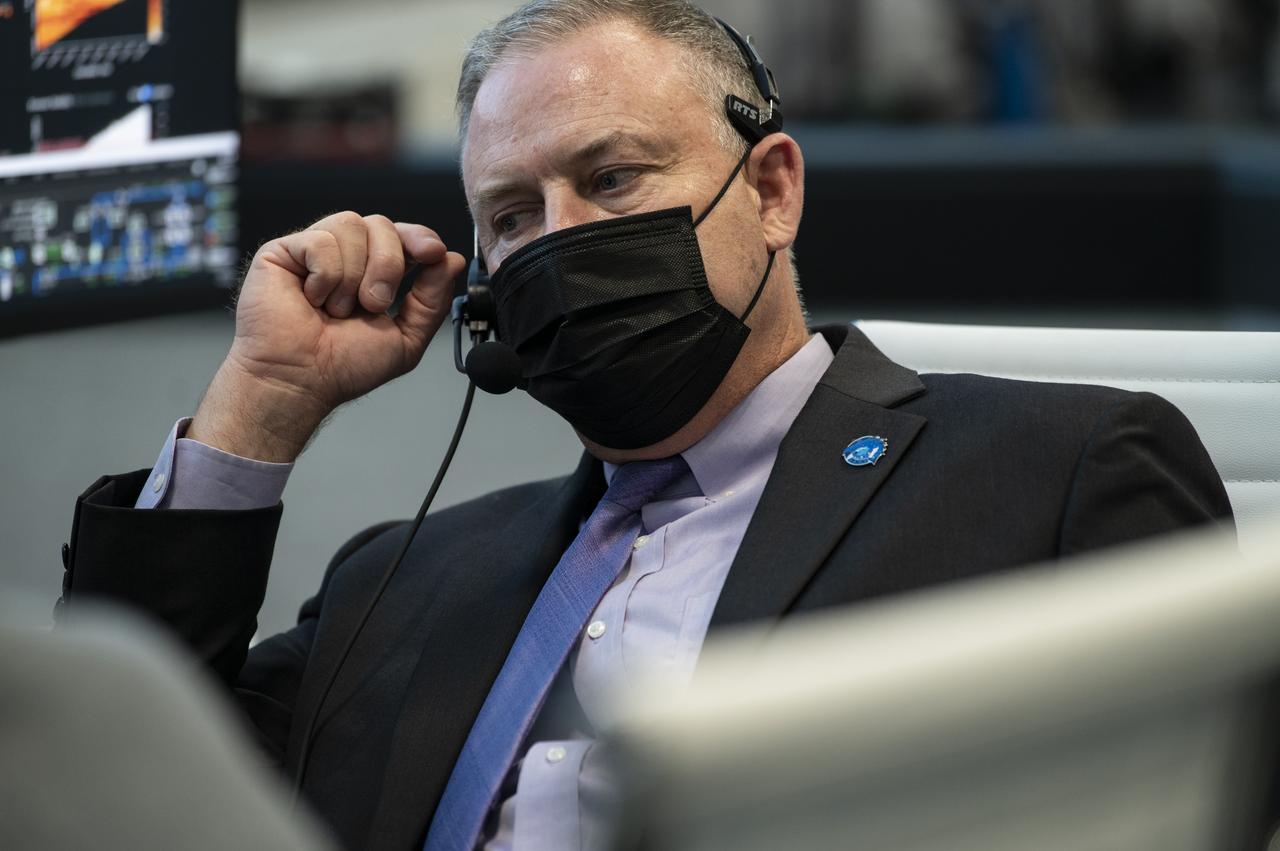 Norm Knight, deputy director of Flight Operations at NASA's Johnson Space Center, monitors the countdown of the launch of a SpaceX Falcon 9 rocket carrying the company's Crew Dragon spacecraft on NASA’s SpaceX Crew-1 mission with NASA astronauts Mike Hopkins, Victor Glover, Shannon Walker, and Japan Aerospace Exploration Agency (JAXA) astronaut Soichi Noguchi onboard, Sunday, Nov. 15, 2020, in firing room four of the Launch Control Center at NASA’s Kennedy Space Center in Florida. NASA’s SpaceX Crew-1 mission is the first crew rotation mission of the SpaceX Crew Dragon spacecraft and Falcon 9 rocket to the International Space Station as part of the agency’s Commercial Crew Program. Hopkins, Glover, Walker, and Noguchi are scheduled to launch at 7:27 p.m. EST, from Launch Complex 39A at the Kennedy Space Center. Photo Credit: (NASA/Aubrey Gemignani)