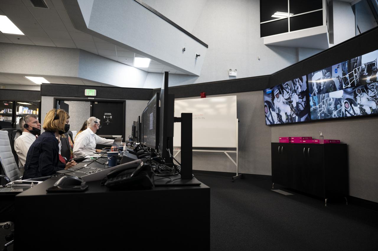 From left to right, Kathy Lueders, Associate Administrator of the Human Exploration and Operations Mission Directorate; Steve Stich, program manager for NASA's Commercial Crew Program; and Benji Reed, director of crew mission management at SpaceX, monitor the countdown of the launch of a SpaceX Falcon 9 rocket carrying the company's Crew Dragon spacecraft on NASA’s SpaceX Crew-1 mission with NASA astronauts Mike Hopkins, Victor Glover, Shannon Walker, and Japan Aerospace Exploration Agency (JAXA) astronaut Soichi Noguchi onboard, Sunday, Nov. 15, 2020, in firing room four of the Launch Control Center at NASA’s Kennedy Space Center in Florida. NASA’s SpaceX Crew-1 mission is the first crew rotation mission of the SpaceX Crew Dragon spacecraft and Falcon 9 rocket to the International Space Station as part of the agency’s Commercial Crew Program. Hopkins, Glover, Walker, and Noguchi are scheduled to launch at 7:27 p.m. EST, from Launch Complex 39A at the Kennedy Space Center. Photo Credit: (NASA/Aubrey Gemignani)