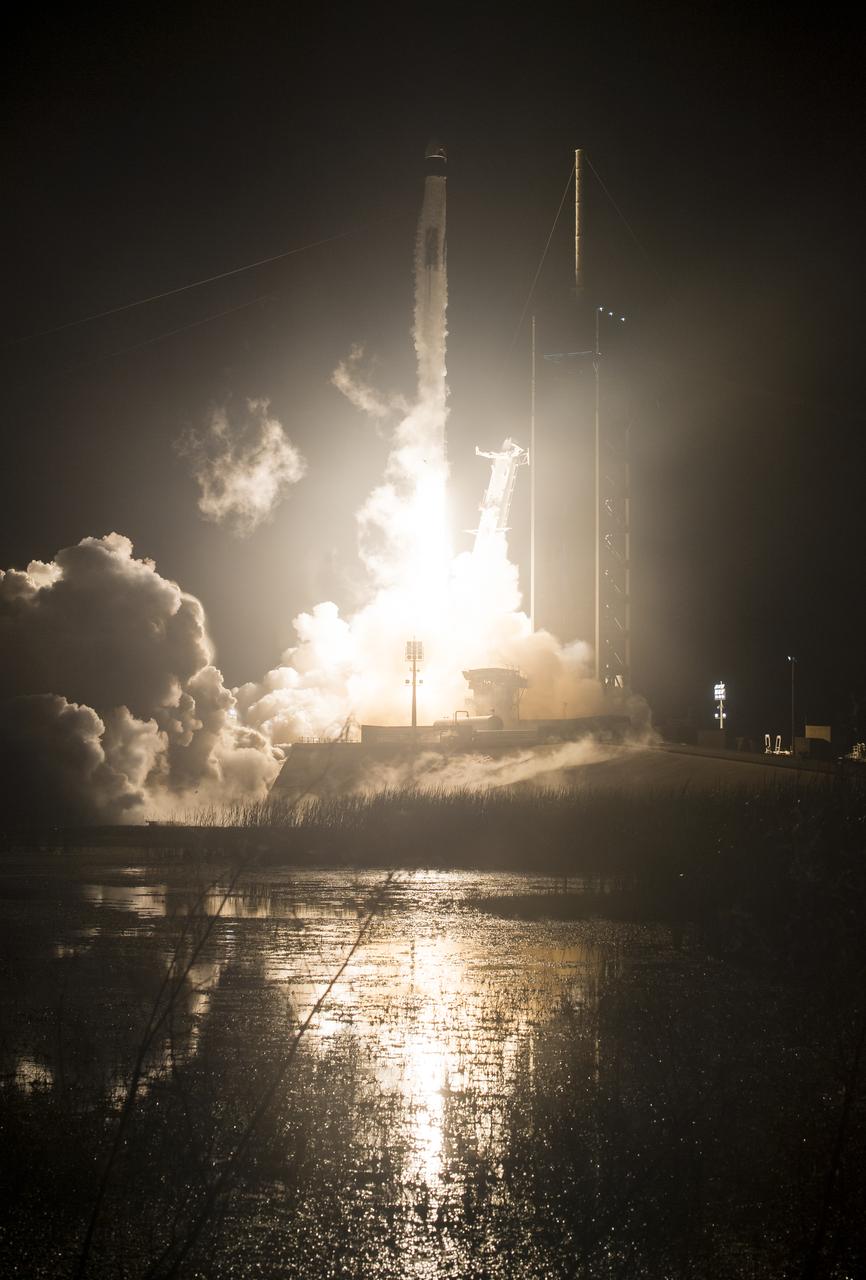 A SpaceX Falcon 9 rocket carrying the company's Crew Dragon spacecraft is launched on NASA’s SpaceX Crew-1 mission to the International Space Station with NASA astronauts Mike Hopkins, Victor Glover, Shannon Walker, and Japan Aerospace Exploration Agency astronaut Soichi Noguchi onboard, Sunday, Nov. 15, 2020, at NASA’s Kennedy Space Center in Florida. NASA’s SpaceX Crew-1 mission is the first crew rotation mission of the SpaceX Crew Dragon spacecraft and Falcon 9 rocket to the International Space Station as part of the agency’s Commercial Crew Program. Hopkins, Glover, Walker, and Noguchi launched at 7:27 p.m. EST from Launch Complex 39A at the Kennedy Space Center to begin a six month mission onboard the orbital outpost. Photo Credit: (NASA/Aubrey Gemignani)