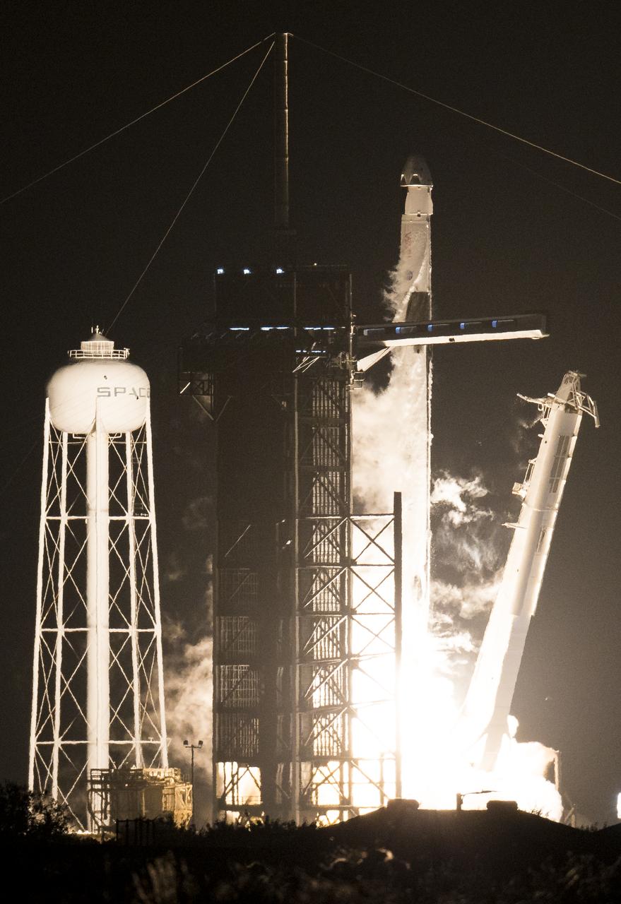 A SpaceX Falcon 9 rocket carrying the company's Crew Dragon spacecraft is launched on NASA’s SpaceX Crew-1 mission to the International Space Station with NASA astronauts Mike Hopkins, Victor Glover, Shannon Walker, and Japan Aerospace Exploration Agency astronaut Soichi Noguchi onboard, Sunday, Nov. 15, 2020, at NASA’s Kennedy Space Center in Florida. NASA’s SpaceX Crew-1 mission is the first crew rotation mission of the SpaceX Crew Dragon spacecraft and Falcon 9 rocket to the International Space Station as part of the agency’s Commercial Crew Program. Hopkins, Glover, Walker, and Noguchi launched at 7:27 p.m. EST from Launch Complex 39A at the Kennedy Space Center to begin a six month mission onboard the orbital outpost. Photo Credit: (NASA/Joel Kowsky)