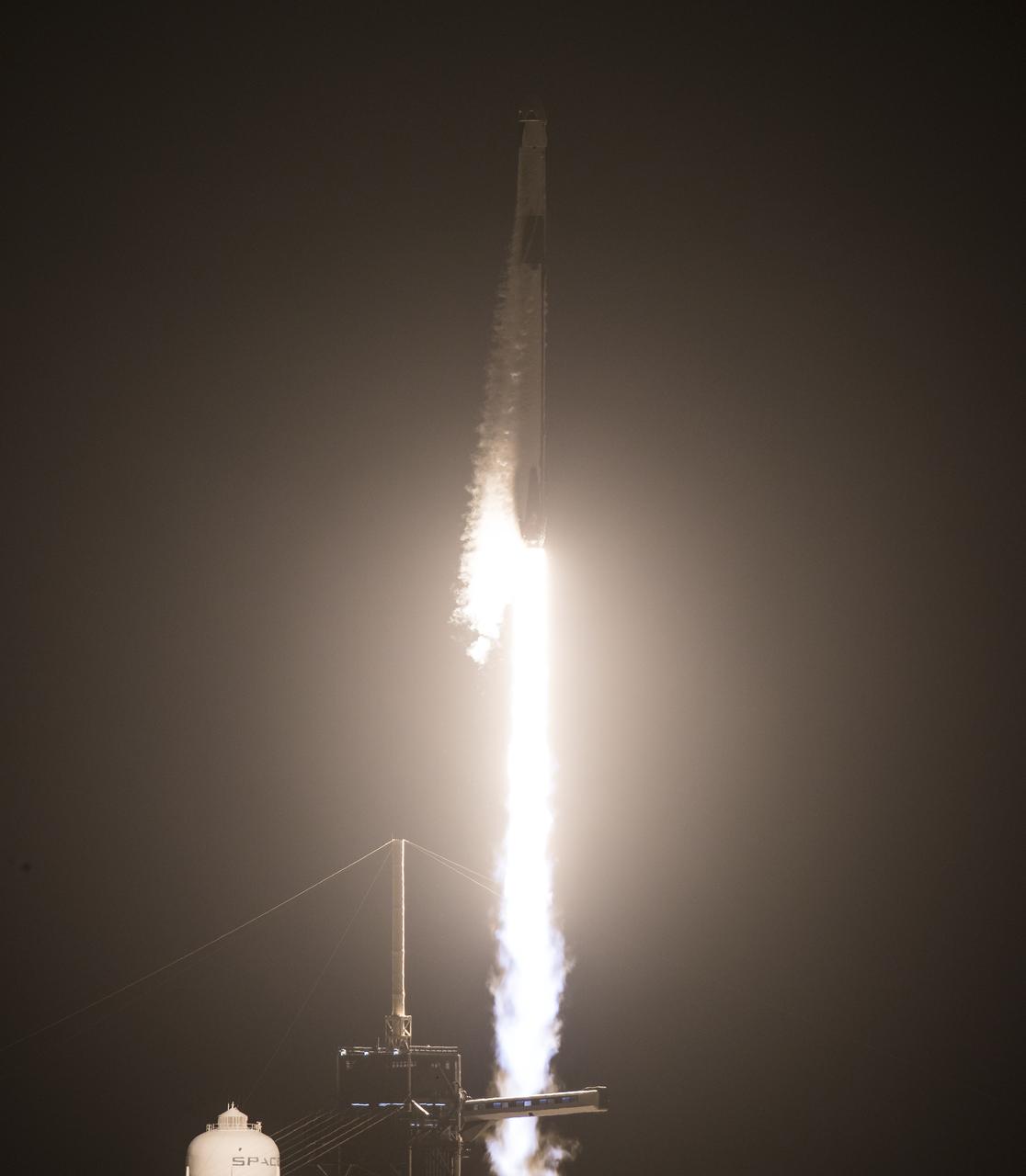 A SpaceX Falcon 9 rocket carrying the company's Crew Dragon spacecraft is launched on NASA’s SpaceX Crew-1 mission to the International Space Station with NASA astronauts Mike Hopkins, Victor Glover, Shannon Walker, and Japan Aerospace Exploration Agency astronaut Soichi Noguchi onboard, Sunday, Nov. 15, 2020, at NASA’s Kennedy Space Center in Florida. NASA’s SpaceX Crew-1 mission is the first crew rotation mission of the SpaceX Crew Dragon spacecraft and Falcon 9 rocket to the International Space Station as part of the agency’s Commercial Crew Program. Hopkins, Glover, Walker, and Noguchi launched at 7:27 p.m. EST from Launch Complex 39A at the Kennedy Space Center to begin a six month mission onboard the orbital outpost. Photo Credit: (NASA/Joel Kowsky)