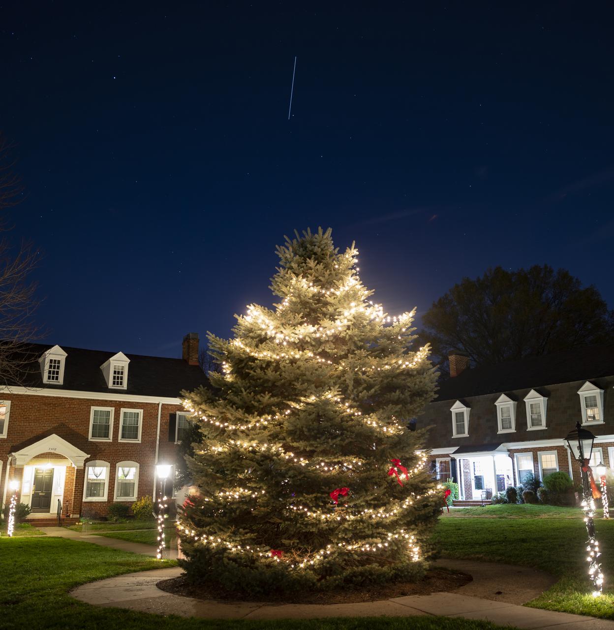 The International Space Station is seen in this 13 second exposure as it flies over Arlington, Virginia, Sunday, Dec. 6, 2020. Onboard are: NASA astronauts Kate Rubins, Shannon Walker, Victor Glover, Mike Hopkins; Japan Aerospace Exploration Agency (JAXA) astronaut Soichi Noguchi; Russian cosmonauts Sergey Ryzhikov, and Sergey Kud-Sverchkov.  Photo Credit: (NASA/Bill Ingalls)