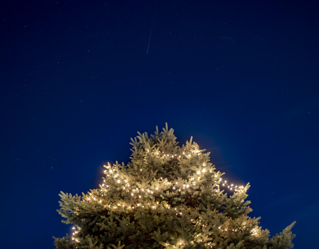 The International Space Station is seen in this 13 second exposure as it flies over Arlington, Virginia, Sunday, Dec. 6, 2020. Onboard are: NASA astronauts Kate Rubins, Shannon Walker, Victor Glover, Mike Hopkins; Japan Aerospace Exploration Agency (JAXA) astronaut Soichi Noguchi; Russian cosmonauts Sergey Ryzhikov, and Sergey Kud-Sverchkov.  Photo Credit: (NASA/Bill Ingalls)
