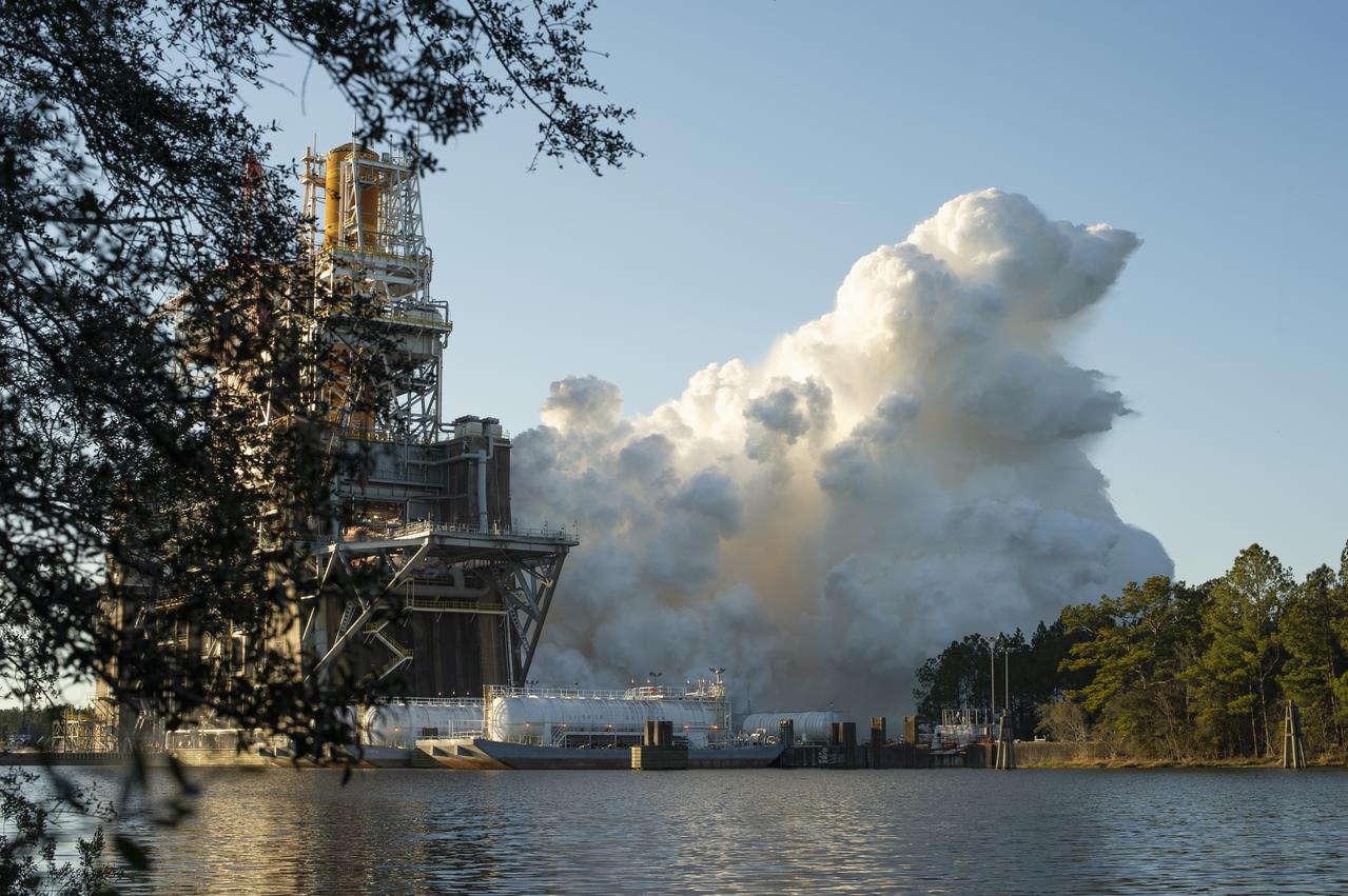 The core stage for the first flight of NASA’s Space Launch System rocket is seen in the B-2 Test Stand during a scheduled eight minute duration hot fire test, Saturday, Jan. 16, 2021, at NASA’s Stennis Space Center near Bay St. Louis, Mississippi. The four RS-25 engines fired for a little more than one minute and generated 1.6 million pounds of thrust. The hot fire is the final test of the Green Run test series, a comprehensive assessment of the Space Launch System’s core stage prior to launching the Artemis I mission to the Moon.  Photo Credit: (NASA/Robert Markowitz)