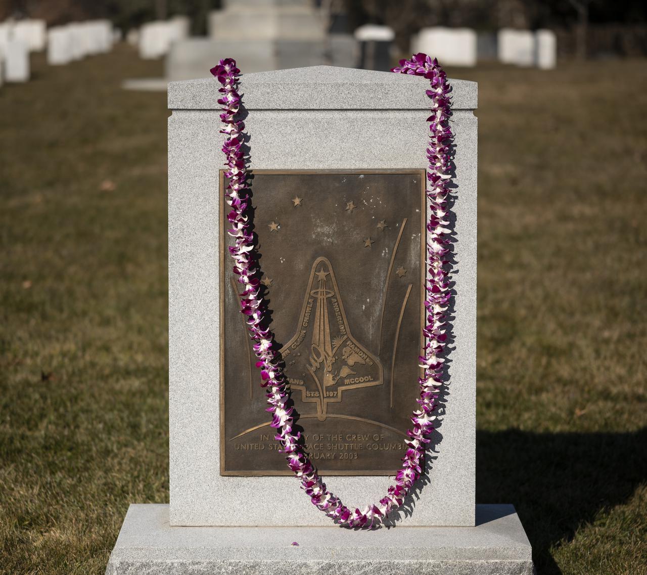 A lei is seen on the Space Shuttle Columbia Memorial after a ceremony that was part of NASA's Day of Remembrance, Thursday, Jan. 28, 2021, at Arlington National Cemetery in Arlington, Va. Wreaths were laid in memory of those men and women who lost their lives in the quest for space exploration. Photo Credit: (NASA/Bill Ingalls)