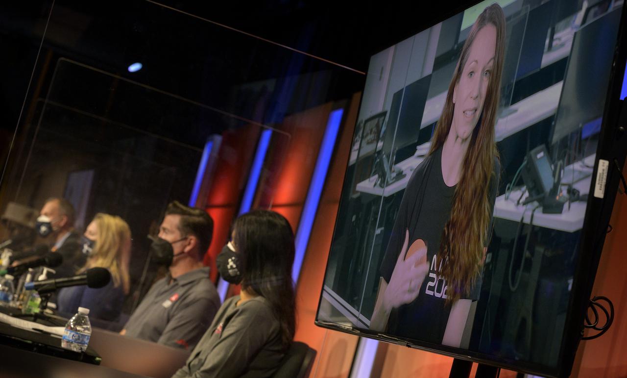 Perseverance entry, descent, and landing systems engineer, JPL, Erisa Stilley, gives remarks via remote during a NASA Perseverance rover mission engineering and technology overview, Tuesday, Feb. 16, 2021, at NASA's Jet Propulsion Laboratory in Pasadena, California. The Perseverance Mars rover is due to land on Mars Thursday, Feb. 18, 2021. A key objective for Perseverance’s mission on Mars is astrobiology, including the search for signs of ancient microbial life. The rover will characterize the planet’s geology and past climate, pave the way for human exploration of the Red Planet, and be the first mission to collect and cache Martian rock and regolith. Photo Credit: (NASA/Bill Ingalls)