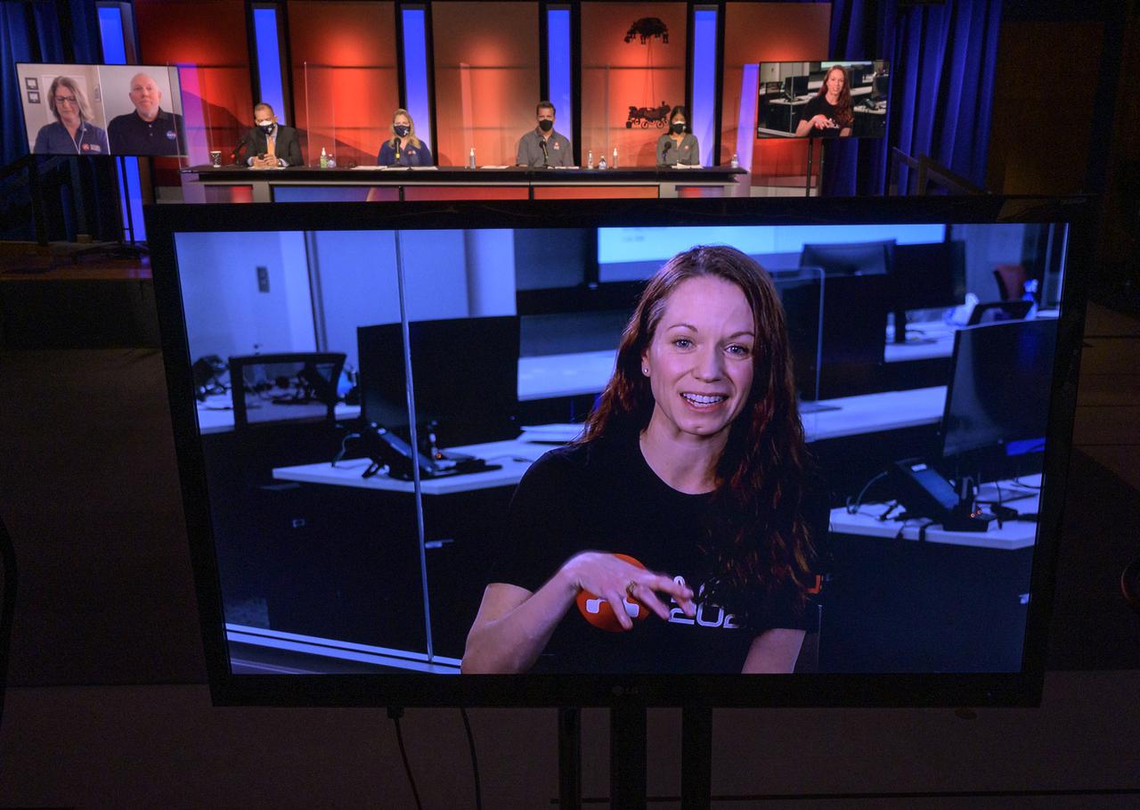 Perseverance entry, descent, and landing systems engineer, JPL, Erisa Stilley, gives remarks via remote during a NASA Perseverance rover mission engineering and technology overview, Tuesday, Feb. 16, 2021, at NASA's Jet Propulsion Laboratory in Pasadena, California. The Perseverance Mars rover is due to land on Mars Thursday, Feb. 18, 2021. A key objective for Perseverance’s mission on Mars is astrobiology, including the search for signs of ancient microbial life. The rover will characterize the planet’s geology and past climate, pave the way for human exploration of the Red Planet, and be the first mission to collect and cache Martian rock and regolith. Photo Credit: (NASA/Bill Ingalls)