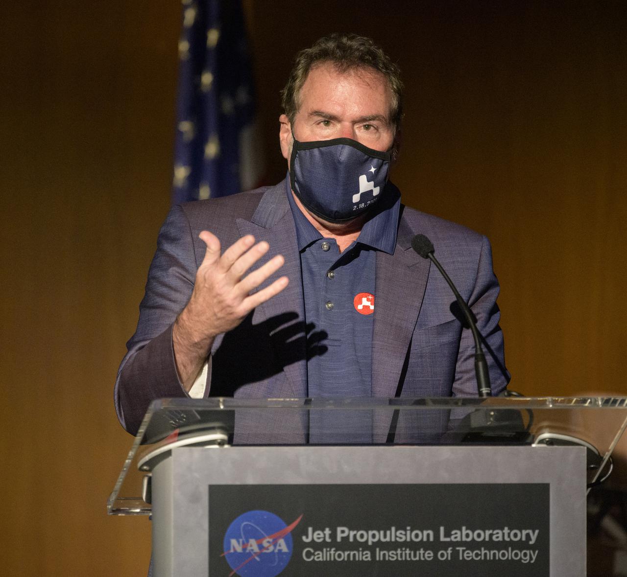 JPL Director Michael Watkins gives remarks during a NASA Perseverance rover mission post-landing update, Thursday, Feb. 18, 2021, at NASA's Jet Propulsion Laboratory in Pasadena, California. A key objective for Perseverance’s mission on Mars is astrobiology, including the search for signs of ancient microbial life. The rover will characterize the planet’s geology and past climate, pave the way for human exploration of the Red Planet, and be the first mission to collect and cache Martian rock and regolith. Photo Credit: (NASA/Bill Ingalls)