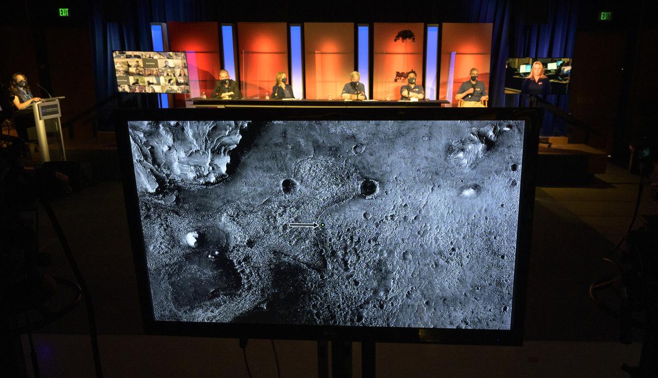 An image showing where Perseverance Mars rover landed is shown during a NASA Perseverance rover mission post-landing update, Thursday, Feb. 18, 2021, at NASA's Jet Propulsion Laboratory in Pasadena, California. A key objective for Perseverance’s mission on Mars is astrobiology, including the search for signs of ancient microbial life. The rover will characterize the planet’s geology and past climate, pave the way for human exploration of the Red Planet, and be the first mission to collect and cache Martian rock and regolith. Photo Credit: (NASA/Bill Ingalls)