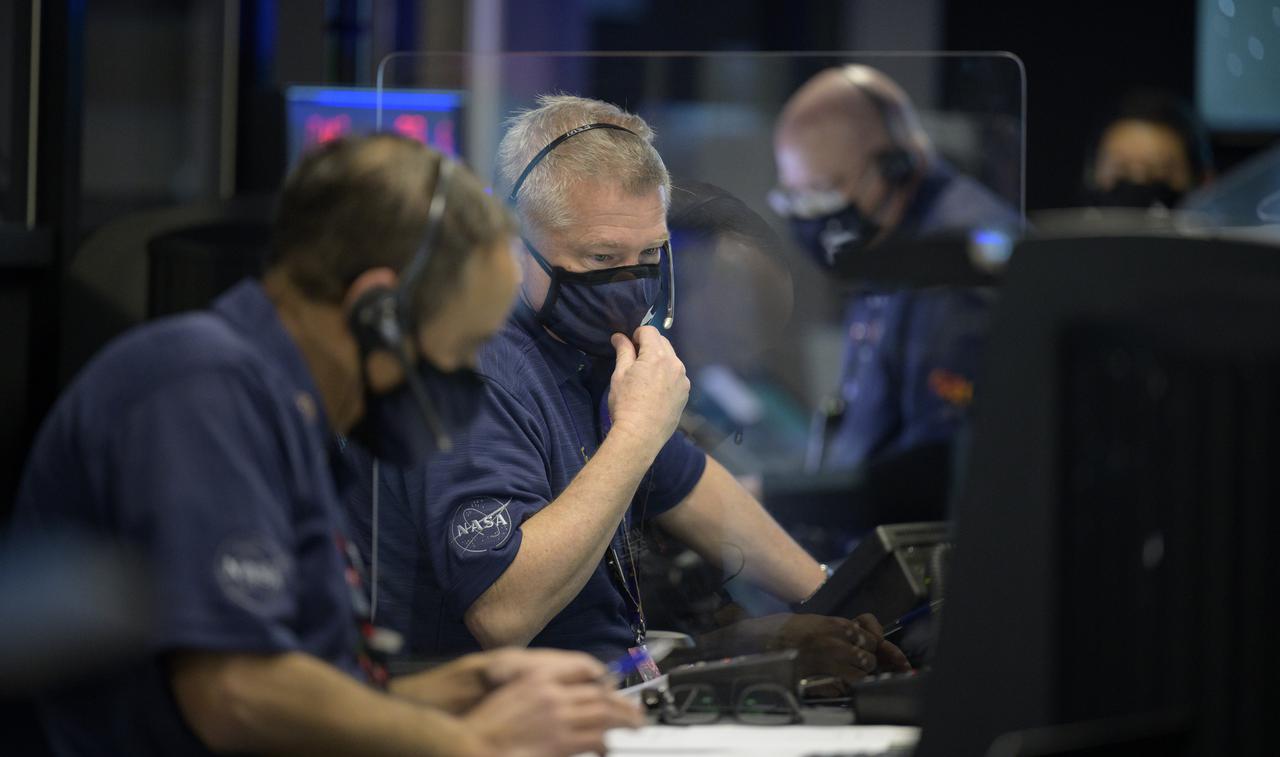 Perseverance mission manager Keith Comeaux is seen in mission control as he and the Perseverance Mars river team monitor the spa crafts approach and landing on Mars, Thursday, Feb. 18, 2021, at NASA's Jet Propulsion Laboratory in Pasadena, California. A key objective for Perseverance’s mission on Mars is astrobiology, including the search for signs of ancient microbial life. The rover will characterize the planet’s geology and past climate, pave the way for human exploration of the Red Planet, and be the first mission to collect and cache Martian rock and regolith. Photo Credit: (NASA/Bill Ingalls)