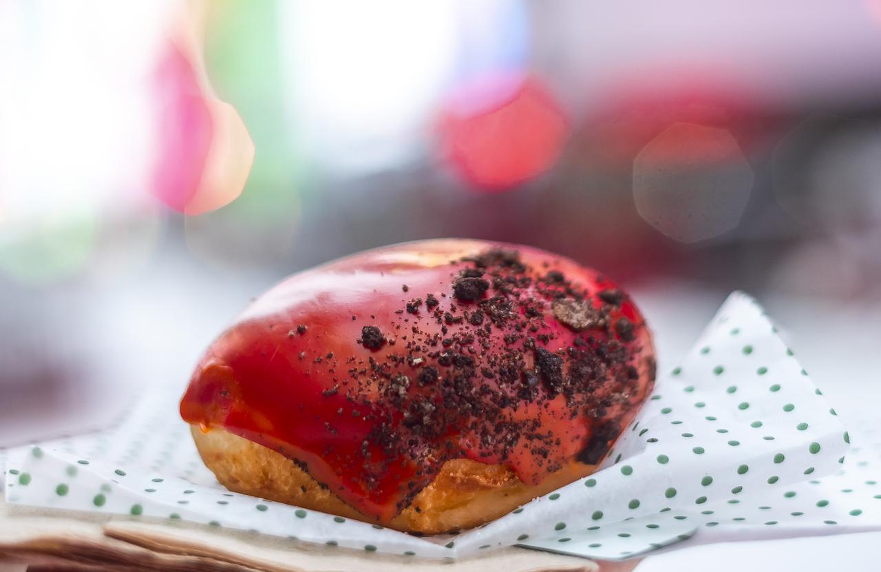 The Krispy Kreme Mars doughnut is seen in New York City, as NASA's Perseverance rover begins its descent towards the surface of Mars, Thursday, Feb. 18, 2021. A key objective for Perseverance’s mission on Mars is astrobiology, including the search for signs of ancient microbial life. The rover will characterize the planet’s geology and past climate, pave the way for human exploration of the Red Planet, and be the first mission to collect and cache Martian rock and regolith. Photo Credit: (NASA/Emma Howells)