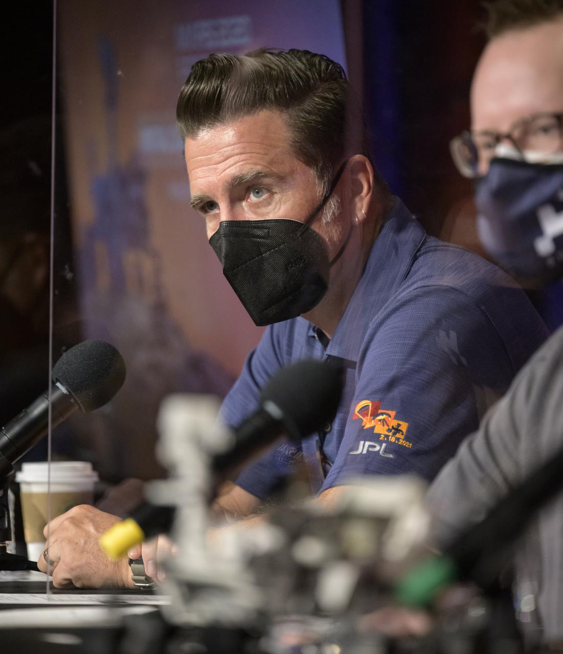 Perseverance chief engineer Adam Steltzner is seen during a NASA Perseverance rover initial surface checkout briefing, Friday Feb. 19, 2021, at NASA's Jet Propulsion Laboratory in Pasadena, California. The Perseverance Mars rover landed on Mars Thursday, Feb. 18, 2021. A key objective for Perseverance’s mission on Mars is astrobiology, including the search for signs of ancient microbial life. The rover will characterize the planet’s geology and past climate, pave the way for human exploration of the Red Planet, and be the first mission to collect and cache Martian rock and regolith. Photo Credit: (NASA/Bill Ingalls)
