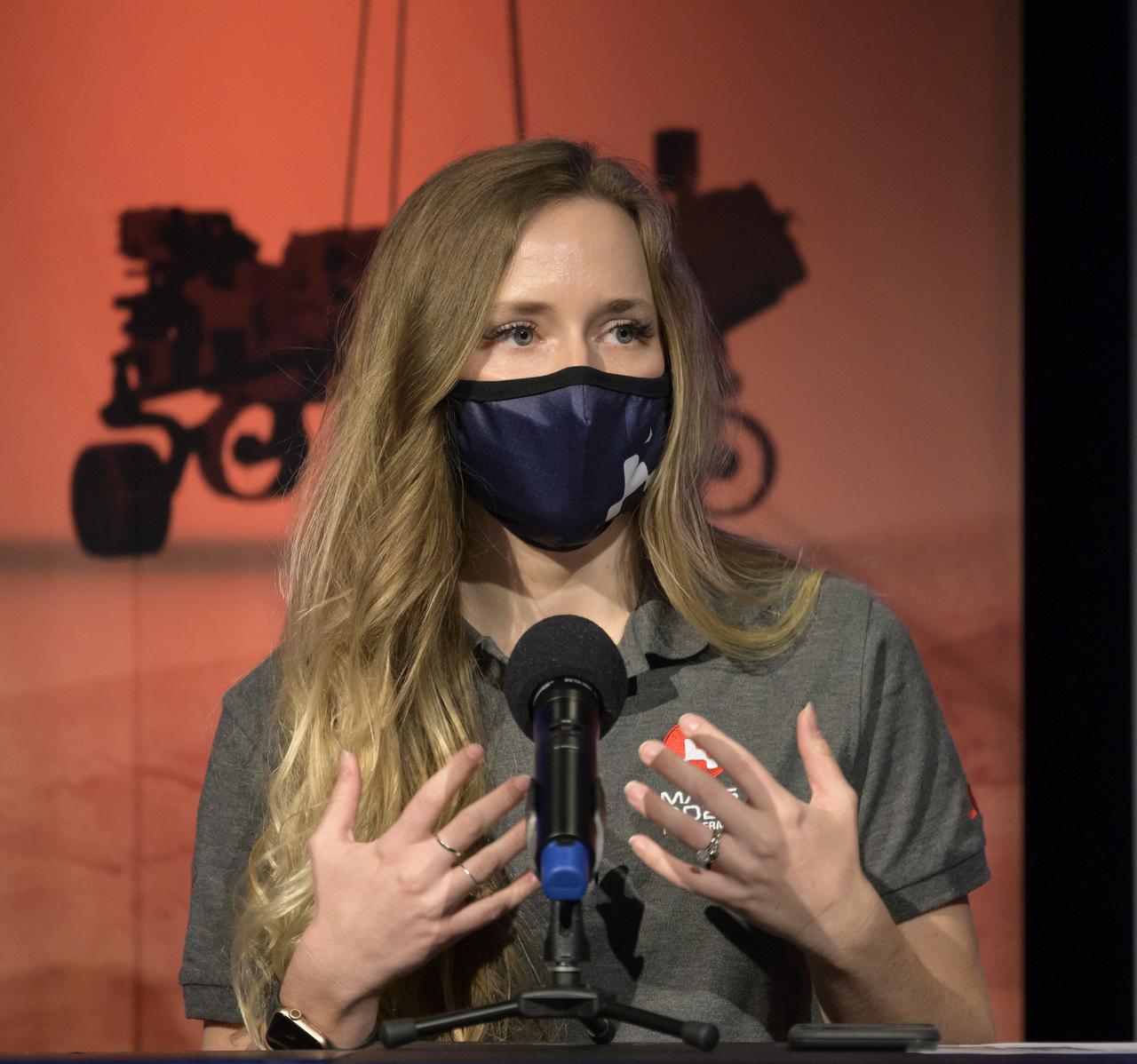 Instrument Data Systems Operations team lead Hallie Gengle, gives remarks during a NASA Perseverance rover initial surface checkout briefing, Friday Feb. 19, 2021, at NASA's Jet Propulsion Laboratory in Pasadena, California. The Perseverance Mars rover landed on Mars Thursday, Feb. 18, 2021. A key objective for Perseverance’s mission on Mars is astrobiology, including the search for signs of ancient microbial life. The rover will characterize the planet’s geology and past climate, pave the way for human exploration of the Red Planet, and be the first mission to collect and cache Martian rock and regolith. Photo Credit: (NASA/Bill Ingalls)