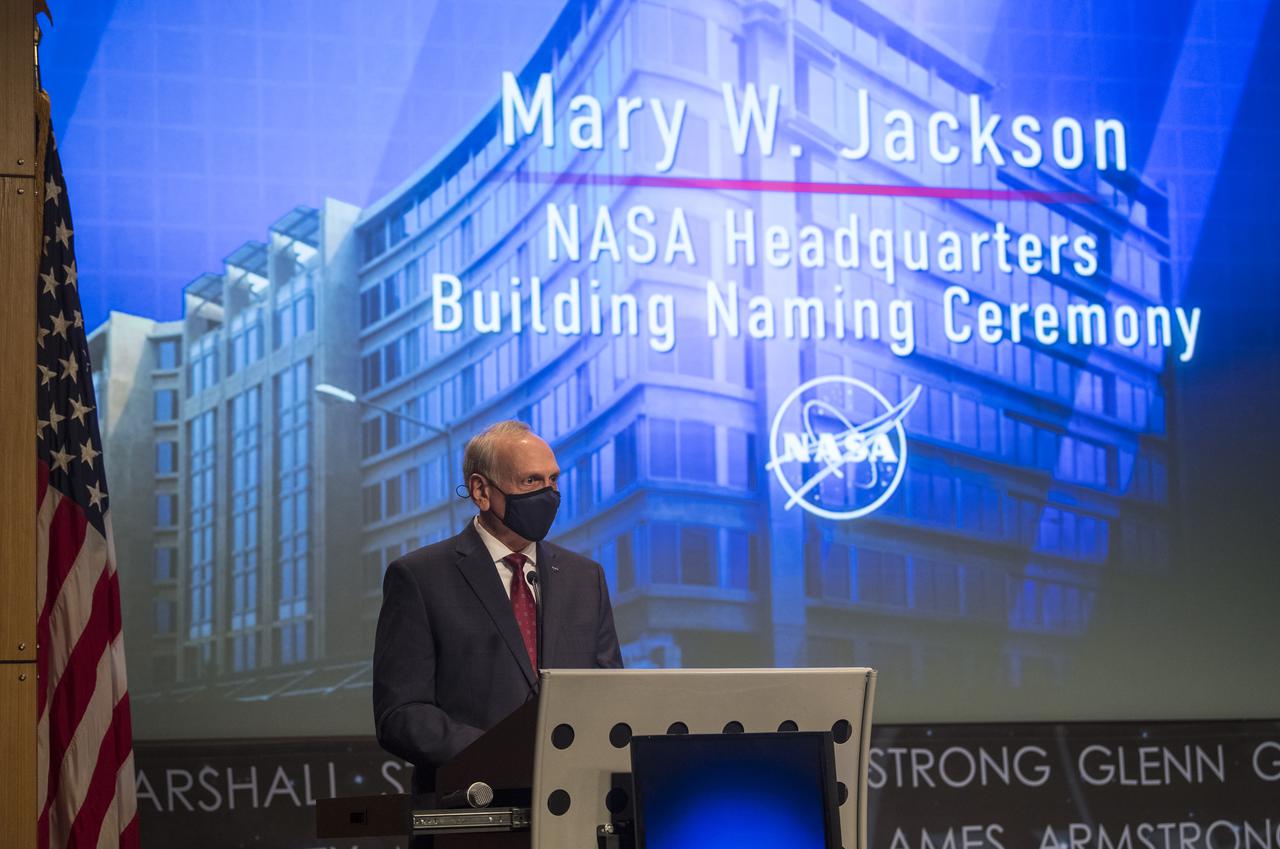 Acting NASA Administrator Steve Jurzyck speaks during a ceremony officially naming the NASA Headquarters building in honor of Mary W. Jackson, Friday, Feb. 26, 2021, at NASA Headquarters in Washington, DC. Mary W. Jackson, the first African American female engineer at NASA, began her career with the agency in the segregated West Area Computing Unit of NASA’s Langley Research Center in Hampton, Virginia. The mathematician and aerospace engineer went on to lead programs influencing the hiring and promotion of women in NASA's science, technology, engineering, and mathematics careers. In 2019, she posthumously received the Congressional Gold Medal. Photo Credit: (NASA/Joel Kowsky)