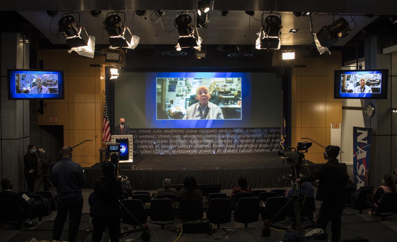 Poet Nikki Giovanni is seen onscreen in a pre-recorded video during a ceremony officially naming the NASA Headquarters building in honor of Mary W. Jackson, Friday, Feb. 26, 2021, at NASA Headquarters in Washington, DC. Mary W. Jackson, the first African American female engineer at NASA, began her career with the agency in the segregated West Area Computing Unit of NASA’s Langley Research Center in Hampton, Virginia. The mathematician and aerospace engineer went on to lead programs influencing the hiring and promotion of women in NASA's science, technology, engineering, and mathematics careers. In 2019, she posthumously received the Congressional Gold Medal. Photo Credit: (NASA/Joel Kowsky)