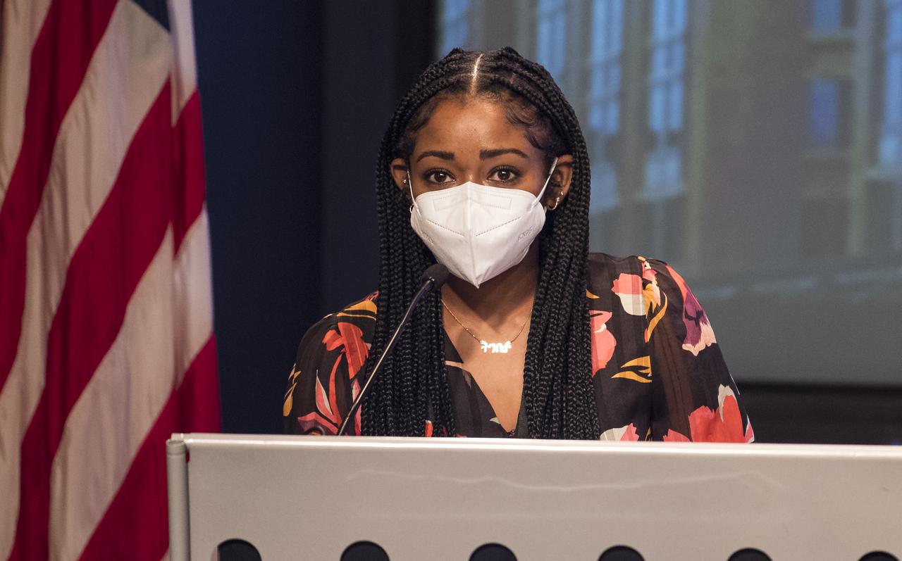 Artist Tenbeete Solomon, also known as Trap Bob, speaks during a ceremony officially naming the NASA Headquarters building in honor of Mary W. Jackson, Friday, Feb. 26, 2021, at NASA Headquarters in Washington, DC. Mary W. Jackson, the first African American female engineer at NASA, began her career with the agency in the segregated West Area Computing Unit of NASA’s Langley Research Center in Hampton, Virginia. The mathematician and aerospace engineer went on to lead programs influencing the hiring and promotion of women in NASA's science, technology, engineering, and mathematics careers. In 2019, she posthumously received the Congressional Gold Medal. Photo Credit: (NASA/Joel Kowsky)