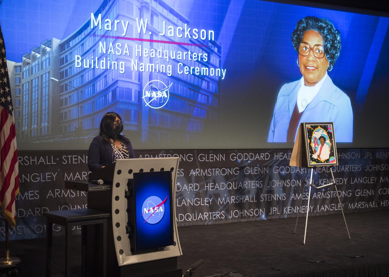 Wanda Jackson, granddaughter of Mary W. Jackson, speaks during a ceremony officially naming the NASA Headquarters building in honor of Mary W. Jackson, Friday, Feb. 26, 2021, at NASA Headquarters in Washington, DC. Mary W. Jackson, the first African American female engineer at NASA, began her career with the agency in the segregated West Area Computing Unit of NASA’s Langley Research Center in Hampton, Virginia. The mathematician and aerospace engineer went on to lead programs influencing the hiring and promotion of women in NASA's science, technology, engineering, and mathematics careers. In 2019, she posthumously received the Congressional Gold Medal. Photo Credit: (NASA/Joel Kowsky)