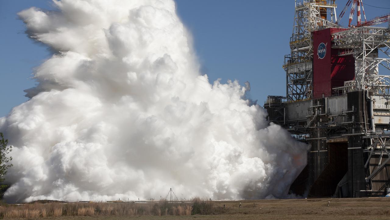 The core stage for the first flight of NASA’s Space Launch System rocket is seen in the B-2 Test Stand during a second hot fire test, Thursday, March 18, 2021, at NASA’s Stennis Space Center near Bay St. Louis, Mississippi. The four RS-25 engines fired for the full-duration of 8 minutes during the test and generated 1.6 million pounds of thrust. The hot fire test is the final stage of the Green Run test series, a comprehensive assessment of the Space Launch System’s core stage prior to launching the Artemis I mission to the Moon.  Photo Credit: (NASA/Robert Markowitz)
