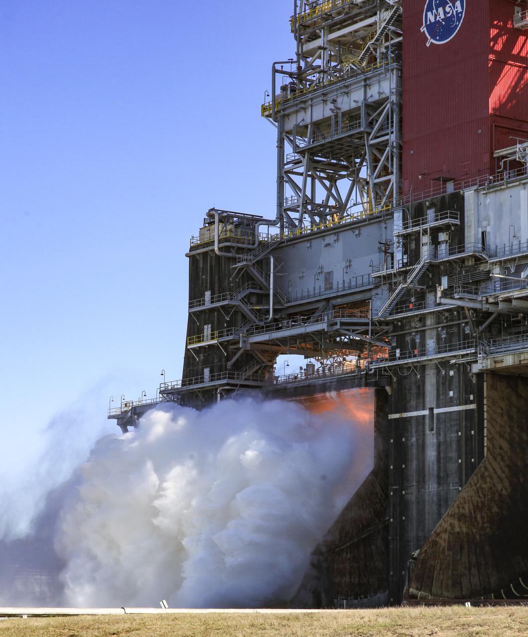 The core stage for the first flight of NASA’s Space Launch System rocket is seen in the B-2 Test Stand during a second hot fire test, Thursday, March 18, 2021, at NASA’s Stennis Space Center near Bay St. Louis, Mississippi. The four RS-25 engines fired for the full-duration of 8 minutes during the test and generated 1.6 million pounds of thrust. The hot fire test is the final stage of the Green Run test series, a comprehensive assessment of the Space Launch System’s core stage prior to launching the Artemis I mission to the Moon. Photo Credit: (NASA/Robert Markowitz)