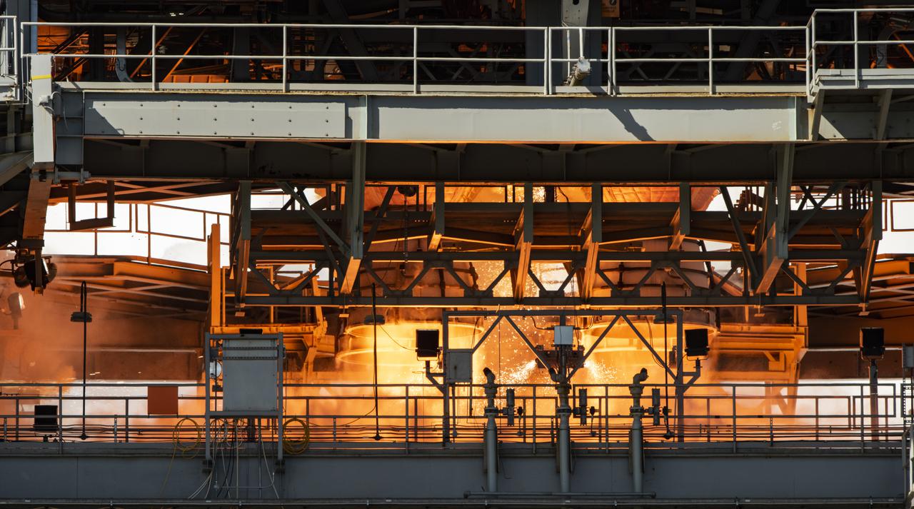The core stage for the first flight of NASA’s Space Launch System rocket is seen in the B-2 Test Stand during a second hot fire test, Thursday, March 18, 2021, at NASA’s Stennis Space Center near Bay St. Louis, Mississippi. The four RS-25 engines fired for the full-duration of 8 minutes during the test and generated 1.6 million pounds of thrust. The hot fire test is the final stage of the Green Run test series, a comprehensive assessment of the Space Launch System’s core stage prior to launching the Artemis I mission to the Moon. Photo Credit: (NASA/Robert Markowitz)