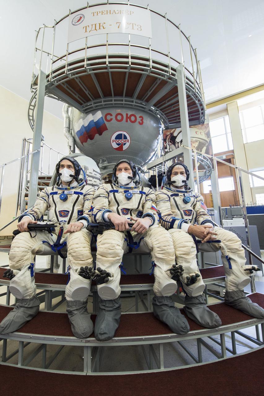 Expedition 65 crew members Russian cosmonaut Pyotr Dubrov of Roscosmos, left, Russian cosmonaut Oleg Novitskiy of Roscosmos, center, and NASA astronaut Mark Vande Hei, pose for a photo during qualification exams, Saturday, March 20, 2021 at the Gagarin Cosmonaut Training Center (GCTC) in Star City, Russia, in advance of their scheduled launch April 9 from Baikonur Cosmodrome in Kazakhstan to the International Space Station. Photo Credit: (NASA/GCTC/Andrey Shelepin)