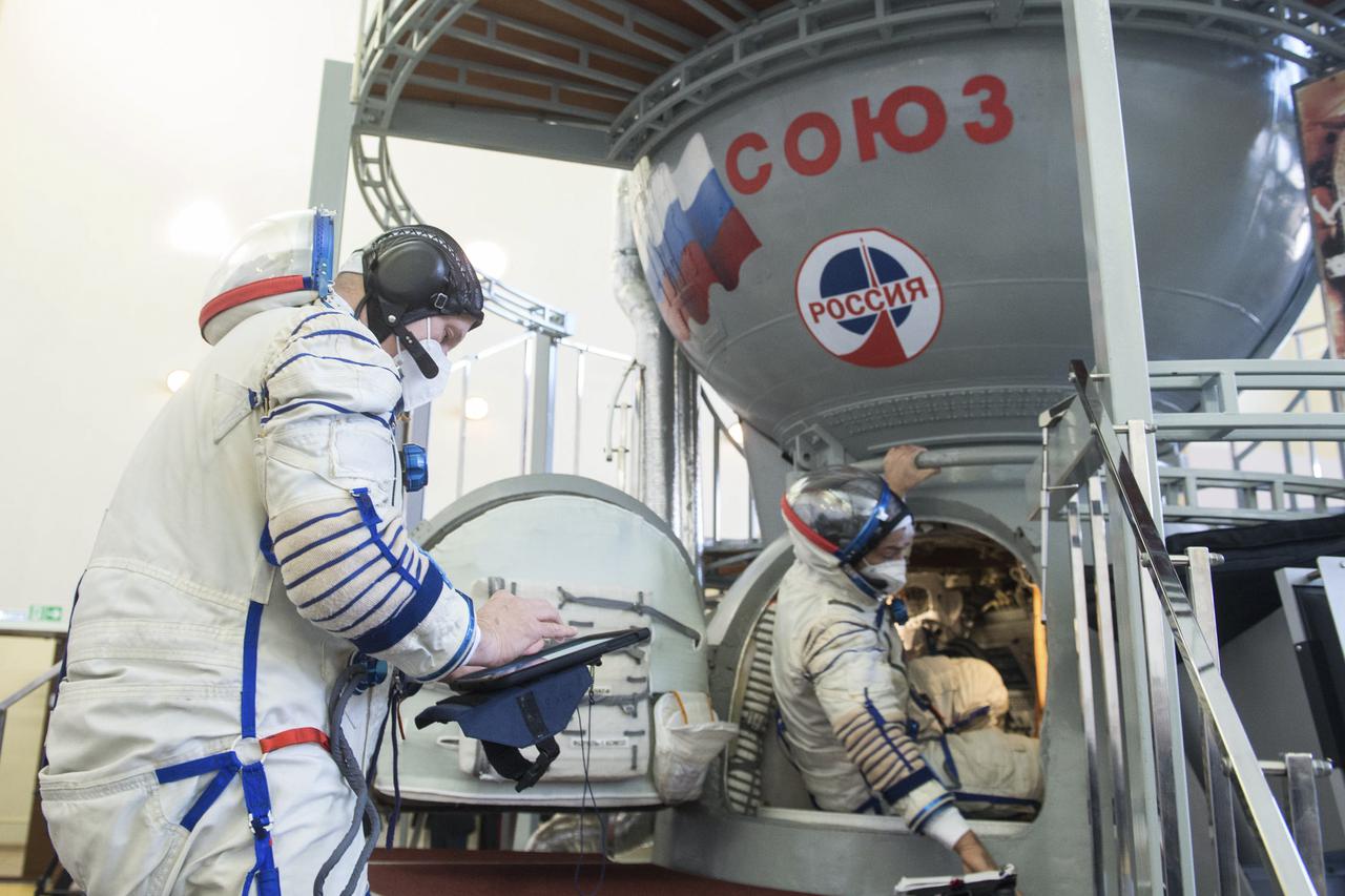 Expedition 65 crew members NASA astronaut Mark Vande Hei, right, and Russian cosmonaut Oleg Novitskiy of Roscosmos, left, are seen during Soyuz qualification exams Saturday, March 20, 2021 at the Gagarin Cosmonaut Training Center (GCTC) in Star City, Russia, in advance of their scheduled launch April 9 from Baikonur Cosmodrome in Kazakhstan to the International Space Station. Photo Credit: (NASA/GCTC/Andrey Shelepin)