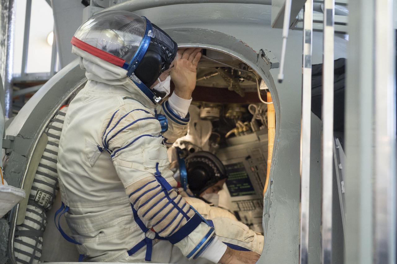 Expedition 65 crew members NASA astronaut Mark Vande Hei, left, and Russian cosmonaut Pyotr Dubrov of Roscosmos are seen during Soyuz qualification exams Saturday, March 20, 2021 at the Gagarin Cosmonaut Training Center (GCTC) in Star City, Russia, in advance of their scheduled launch April 9 from Baikonur Cosmodrome in Kazakhstan to the International Space Station. Photo Credit: (NASA/GCTC/Andrey Shelepin)