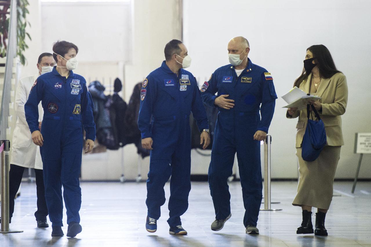 Expedition 65 backup crew members NASA astronaut Anne McClain, left, Russian cosmonaut Anton Shkaplerov of Roscosmos, center, and Russian cosmonaut Oleg Artemyev of Roscosmos arrive for Soyuz qualification exams Saturday, March 20, 2021 at the Gagarin Cosmonaut Training Center (GCTC) in Star City, Russia, in advance of the Expedition 65 launch April 9 from Baikonur Cosmodrome in Kazakhstan to the International Space Station. Photo Credit: (NASA/GCTC/Andrey Shelepin)