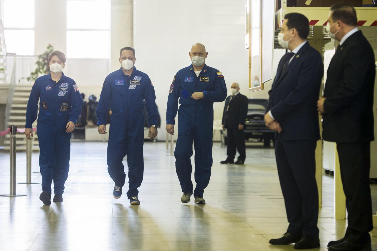 Expedition 65 backup crew members NASA astronaut Anne McClain, left, Russian cosmonaut Anton Shkaplerov of Roscosmos, center, and Russian cosmonaut Oleg Artemyev of Roscosmos arrive for Soyuz qualification exams Saturday, March 20, 2021 at the Gagarin Cosmonaut Training Center (GCTC) in Star City, Russia, in advance of the Expedition 65 launch April 9 from Baikonur Cosmodrome in Kazakhstan to the International Space Station. Photo Credit: (NASA/GCTC/Andrey Shelepin)