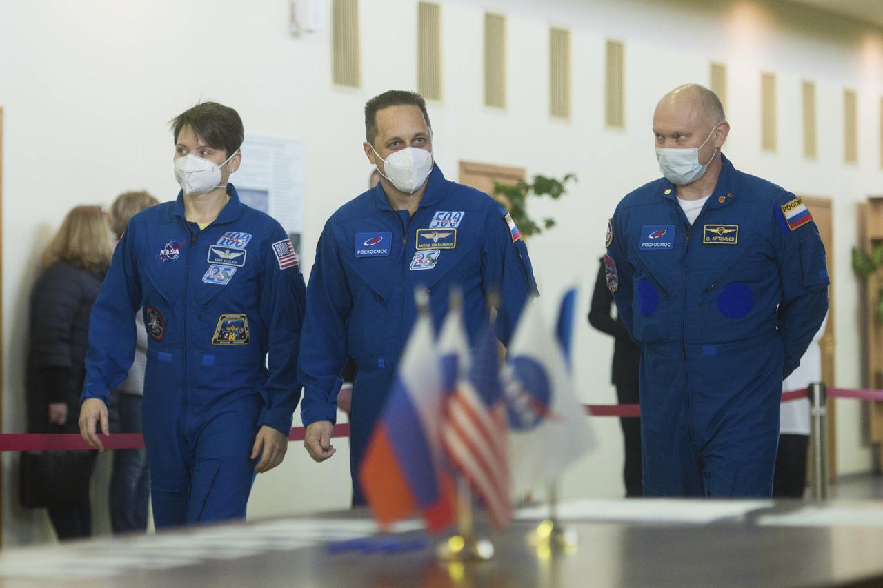 Expedition 65 backup crew members NASA astronaut Anne McClain, left, Russian cosmonaut Anton Shkaplerov of Roscosmos, center, and Russian cosmonaut Oleg Artemyev of Roscosmos arrive for Soyuz qualification exams Saturday, March 20, 2021 at the Gagarin Cosmonaut Training Center (GCTC) in Star City, Russia, in advance of the Expedition 65 launch April 9 from Baikonur Cosmodrome in Kazakhstan to the International Space Station. Photo Credit: (NASA/GCTC/Andrey Shelepin)