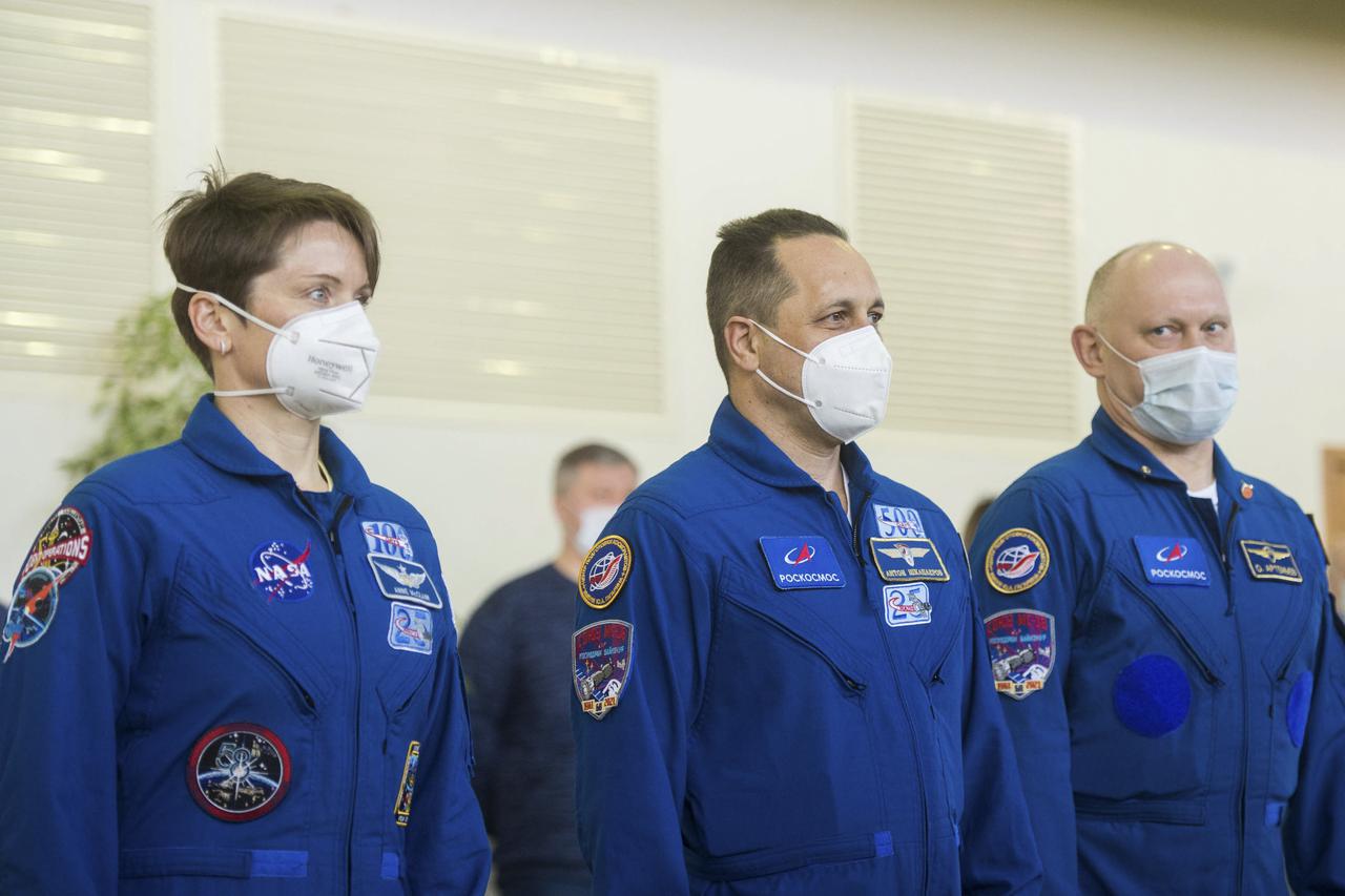 Expedition 65 backup crew members NASA astronaut Anne McClain, left, Russian cosmonaut Anton Shkaplerov of Roscosmos, center, and Russian cosmonaut Oleg Artemyev of Roscosmos arrive for Soyuz qualification exams Saturday, March 20, 2021 at the Gagarin Cosmonaut Training Center (GCTC) in Star City, Russia, in advance of the Expedition 65 launch April 9 from Baikonur Cosmodrome in Kazakhstan to the International Space Station. Photo Credit: (NASA/GCTC/Andrey Shelepin)