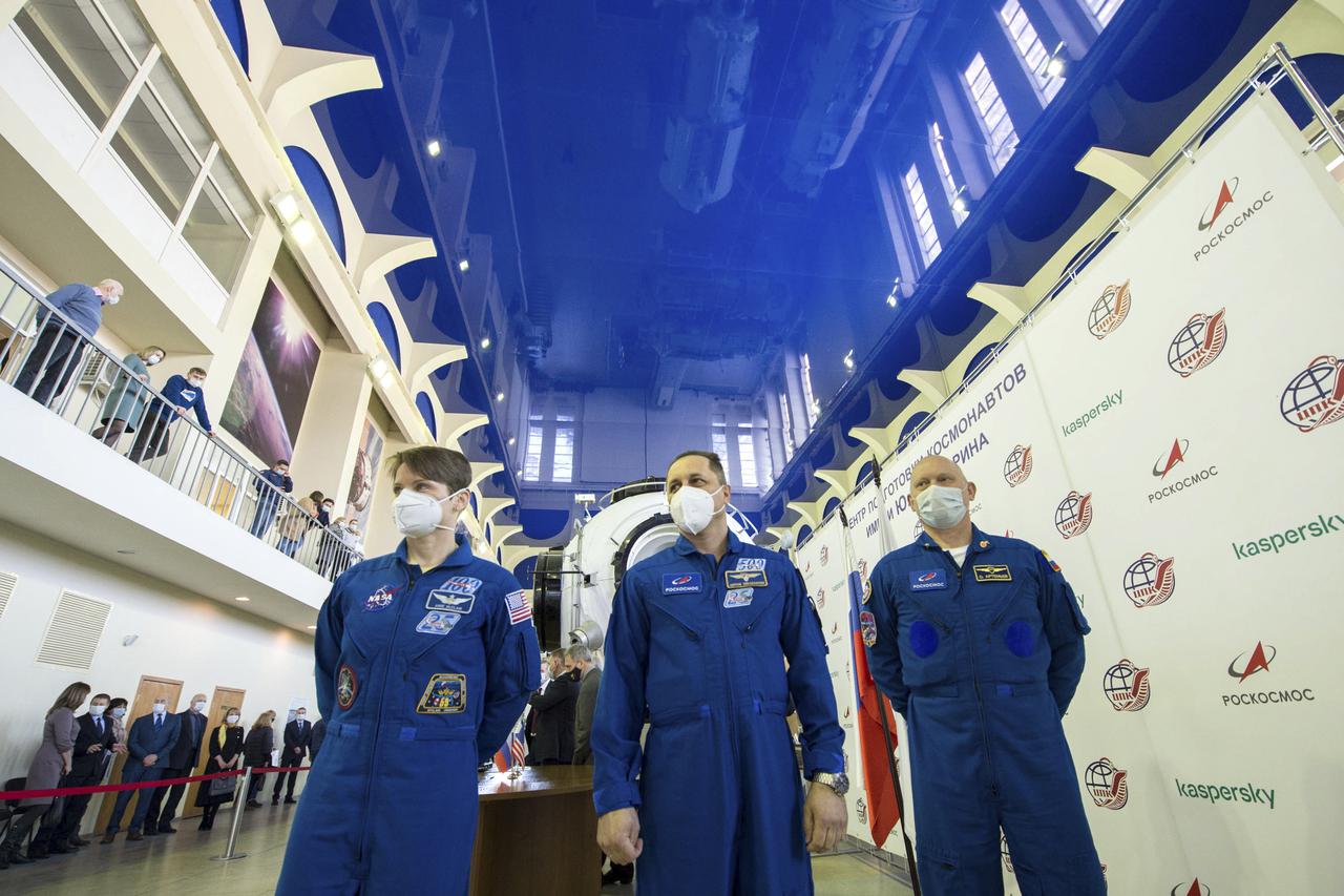 Expedition 65 backup crew members NASA astronaut Anne McClain, left, Russian cosmonaut Anton Shkaplerov of Roscosmos, center, and Russian cosmonaut Oleg Artemyev of Roscosmos arrive for Soyuz qualification exams Saturday, March 20, 2021 at the Gagarin Cosmonaut Training Center (GCTC) in Star City, Russia, in advance of the Expedition 65 launch April 9 from Baikonur Cosmodrome in Kazakhstan to the International Space Station. Photo Credit: (NASA/GCTC/Andrey Shelepin)