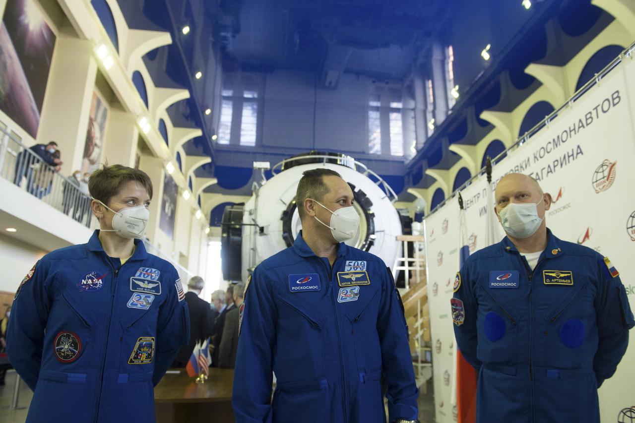 Expedition 65 backup crew members NASA astronaut Anne McClain, left, Russian cosmonaut Anton Shkaplerov of Roscosmos, center, and Russian cosmonaut Oleg Artemyev of Roscosmos arrive for Soyuz qualification exams Saturday, March 20, 2021 at the Gagarin Cosmonaut Training Center (GCTC) in Star City, Russia, in advance of the Expedition 65 launch April 9 from Baikonur Cosmodrome in Kazakhstan to the International Space Station. Photo Credit: (NASA/GCTC/Andrey Shelepin)