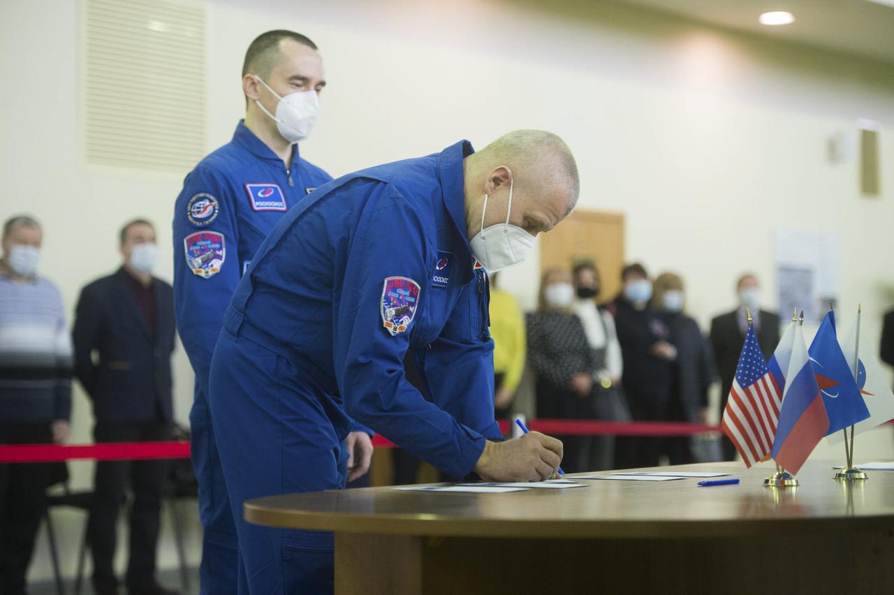 Expedition 65 crew member Oleg Novitskiy of Roscosmos, signs in for Soyuz qualification exams Monday, March 22, 2021, at the Gagarin Cosmonaut Training Center (GCTC) in Star City, Russia, in advance of his scheduled launch April 9 from Baikonur Cosmodrome in Kazakhstan to the International Space Station. Photo Credit: (NASA/GCTC/Andrey Shelepin)