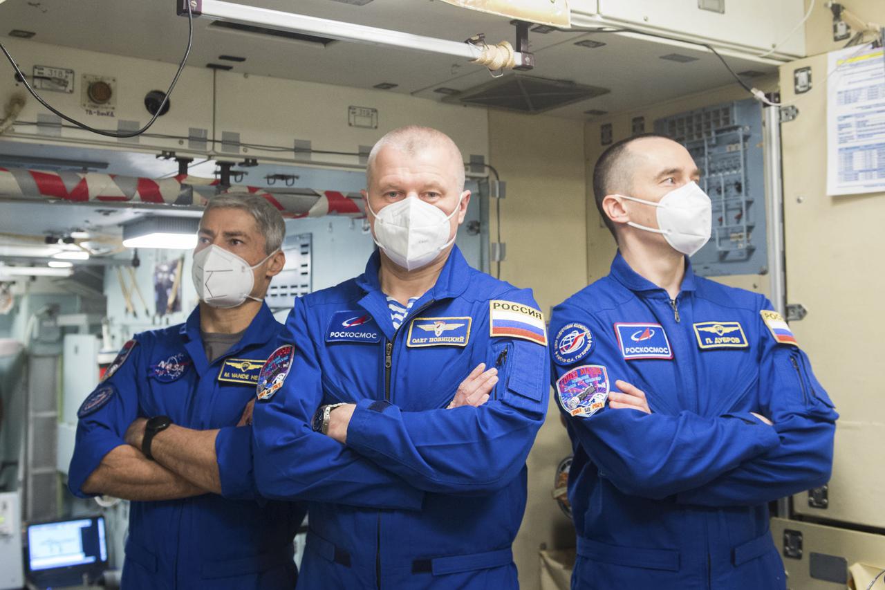 Expedition 65 crew members NASA astronaut Mark Vande Hei, left, Russian cosmonaut Oleg Novitskiy of Roscosmos, center, and Russian cosmonaut Pyotr Dubrov of Roscosmos pose for a photo during Soyuz qualification exams Monday, March 22, 2021, at the Gagarin Cosmonaut Training Center (GCTC) in Star City, Russia, in advance of their scheduled launch April 9 from Baikonur Cosmodrome in Kazakhstan to the International Space Station. Photo Credit: (NASA/GCTC/Andrey Shelepin)